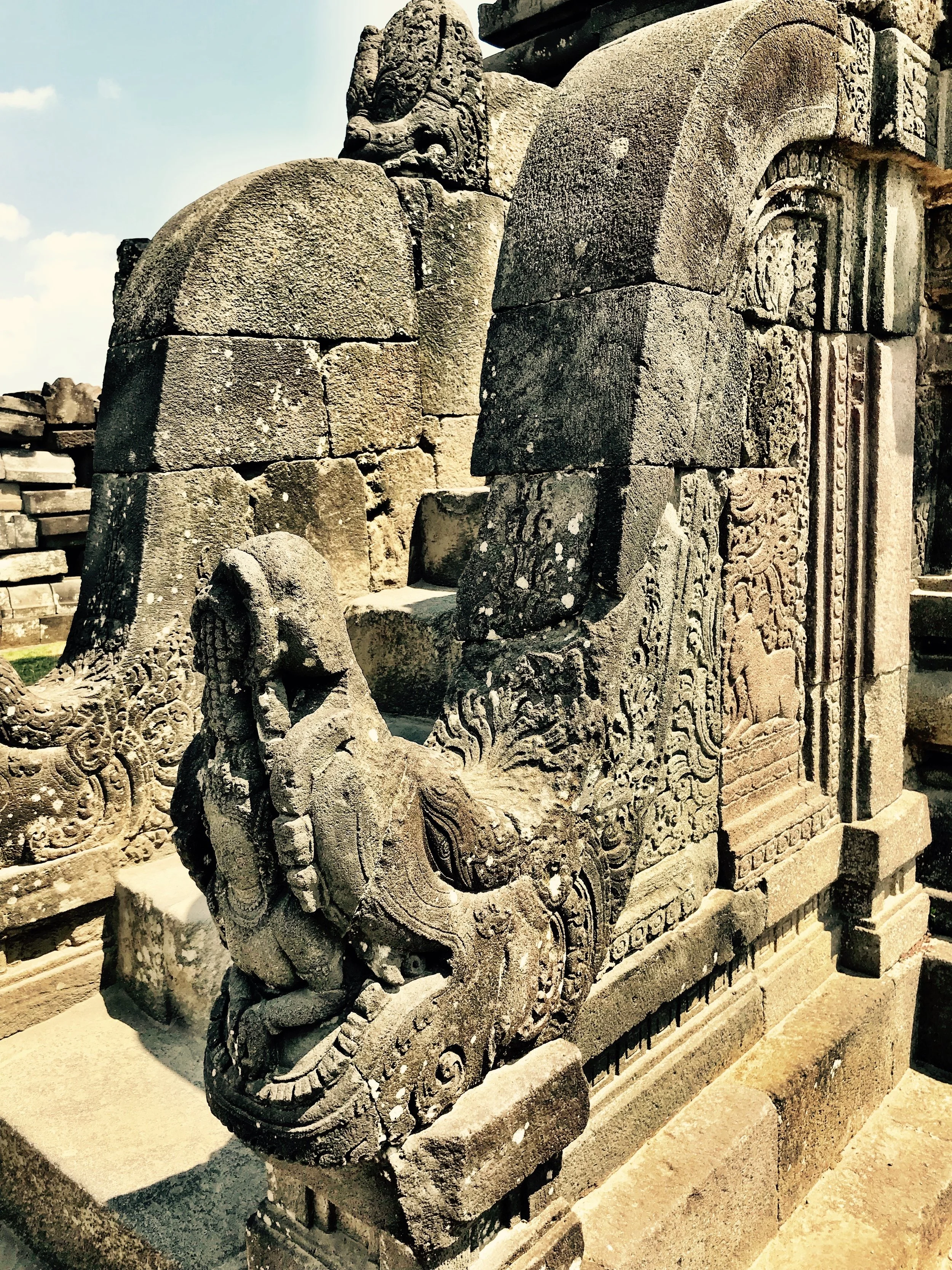 The staircases are carved in the shape of mekara, creatures with other beings coming out of their mouths
