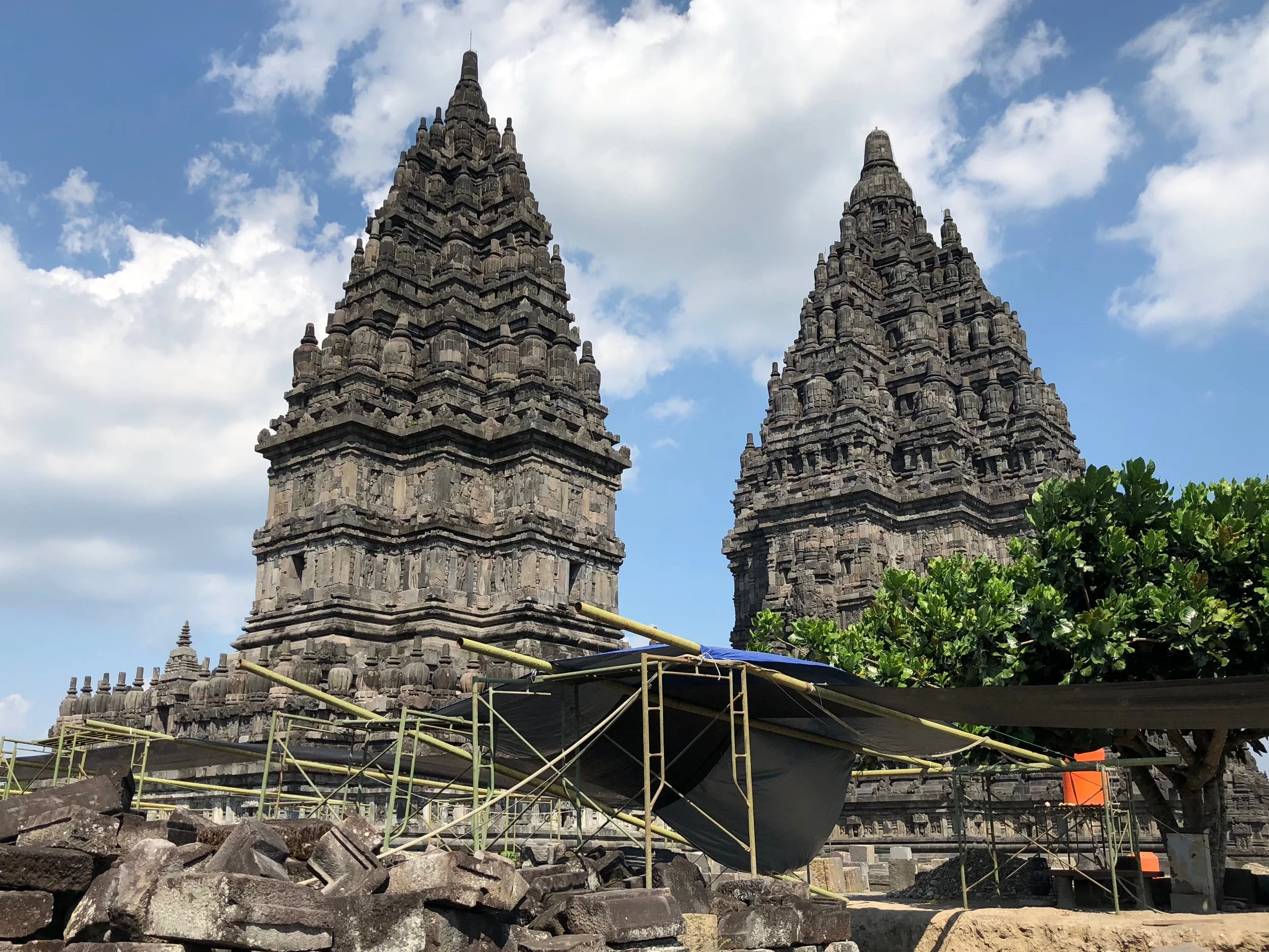 Around back, there were scaffolds, work in progress — and no tourists — so we were able to make our escape from all the attention