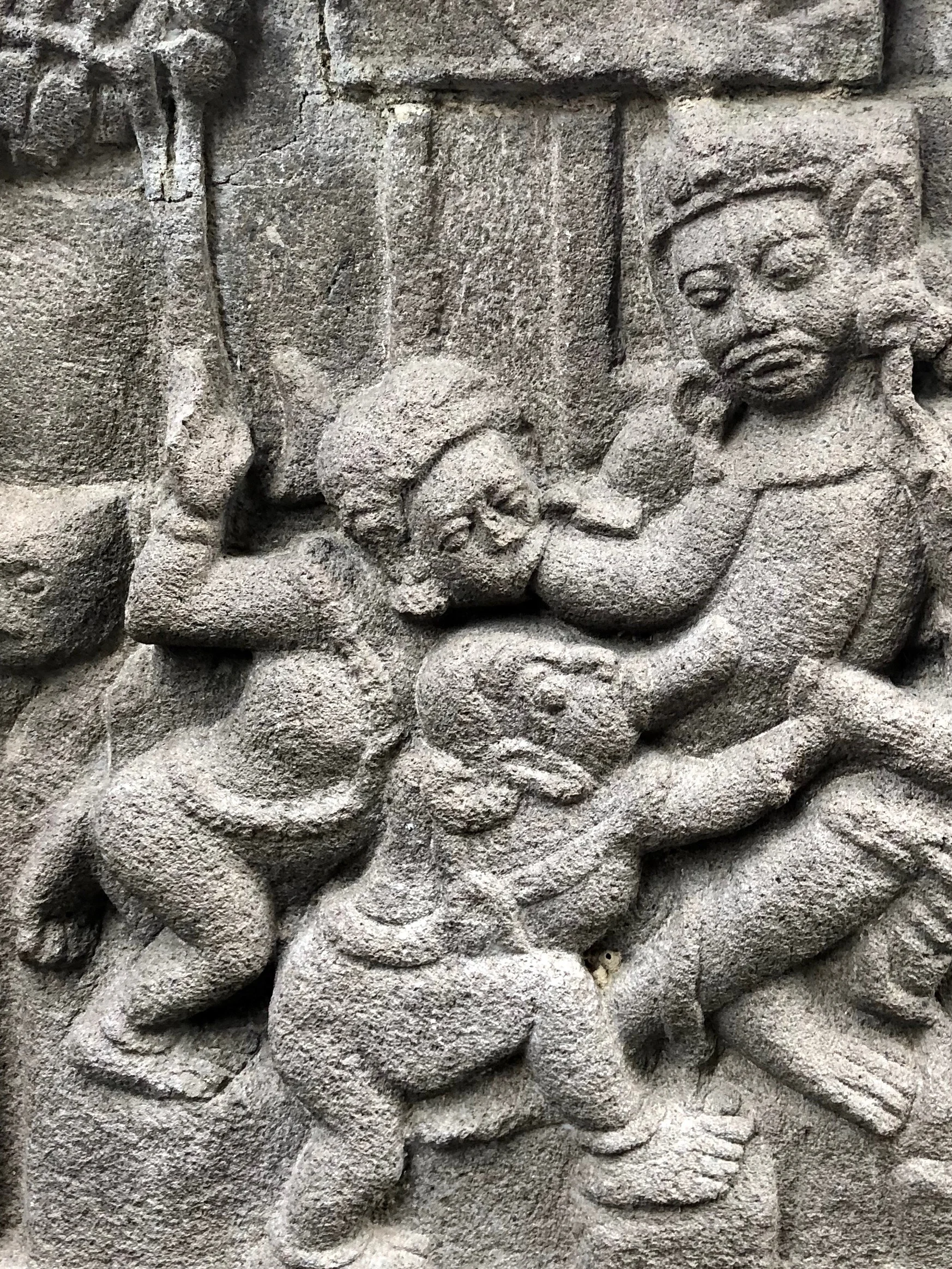 Are they breastfeeding? Some of the carvings on Hindu temples can be quite bizarre