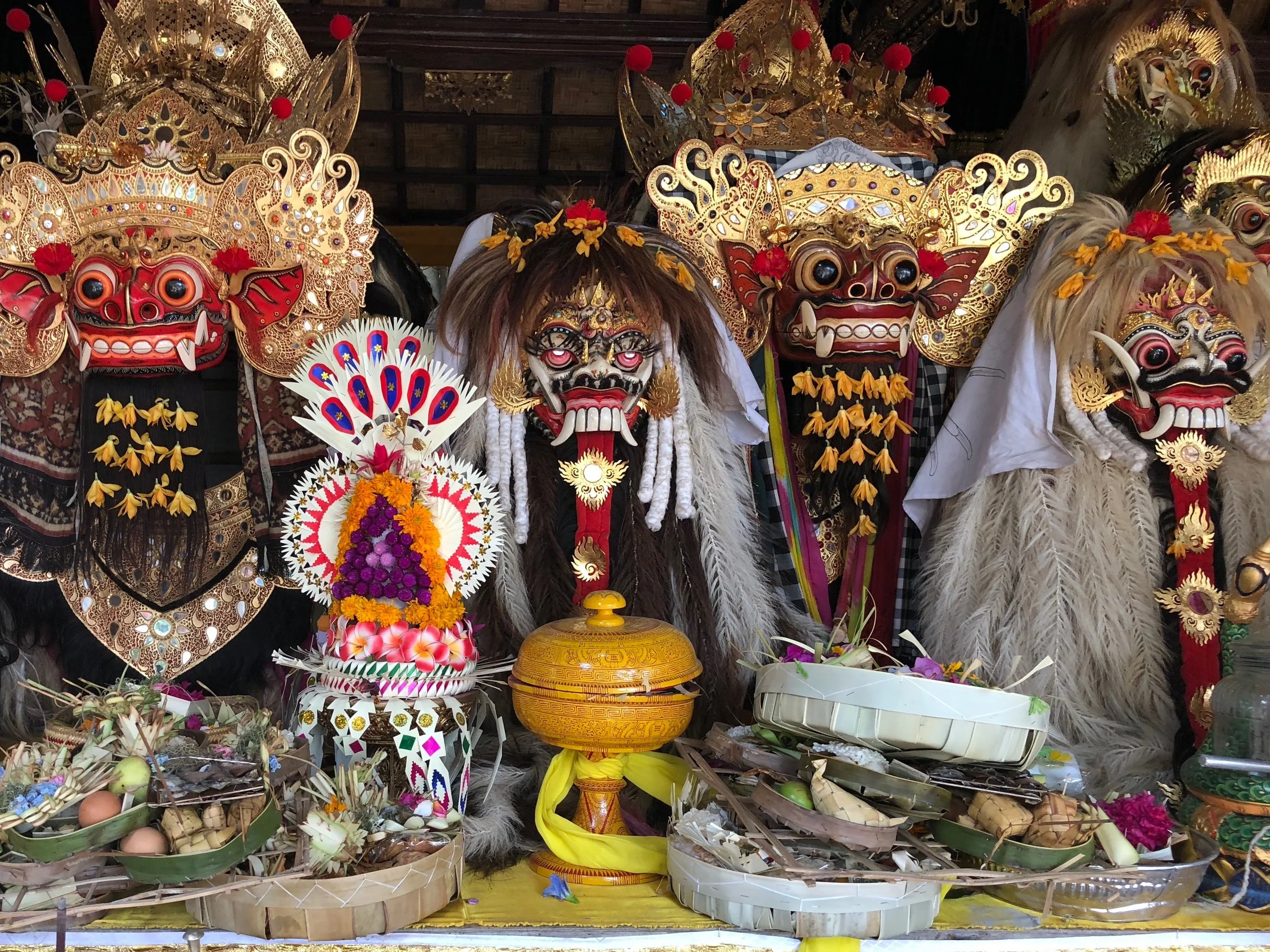 Barong engages in a never-ending fight with the Demon Queen, Rangda, in the middle