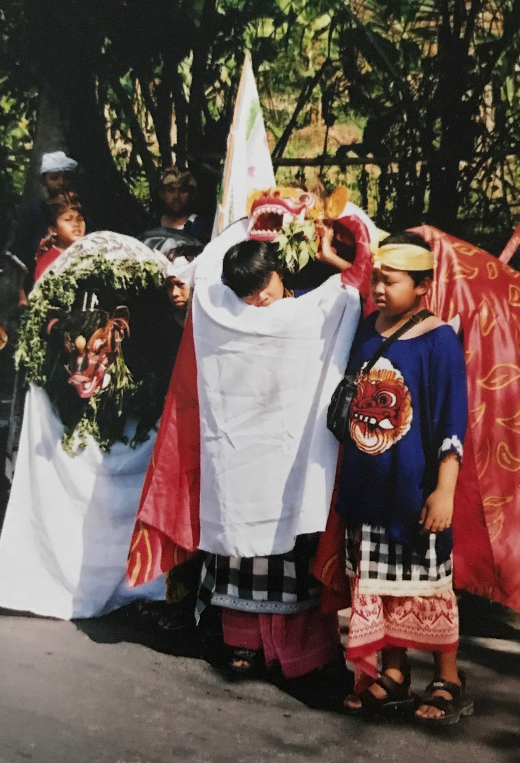During the Galungan festivities, boys don the Barong mask and parade through town, looking for sweets
