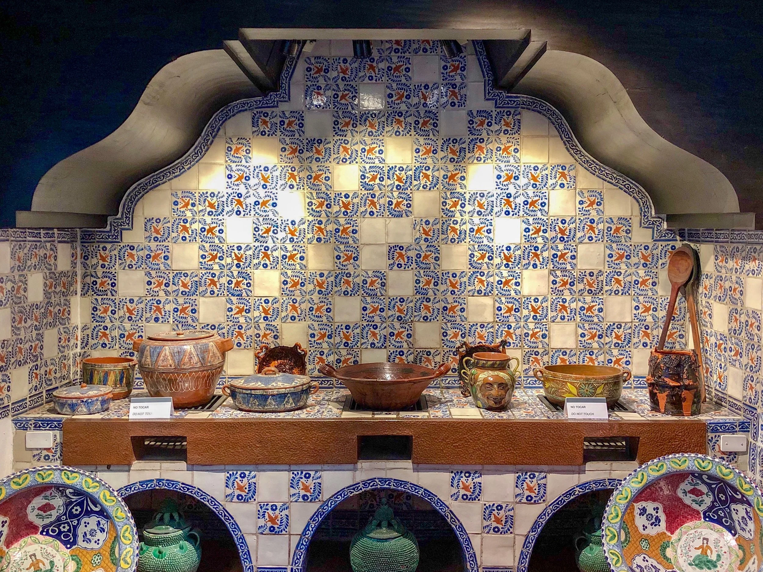 The Colonial kitchen is covered with hand-painted Talavera tile from Puebla, with a swallow bird motif, and was preserved from the 16th century hacienda