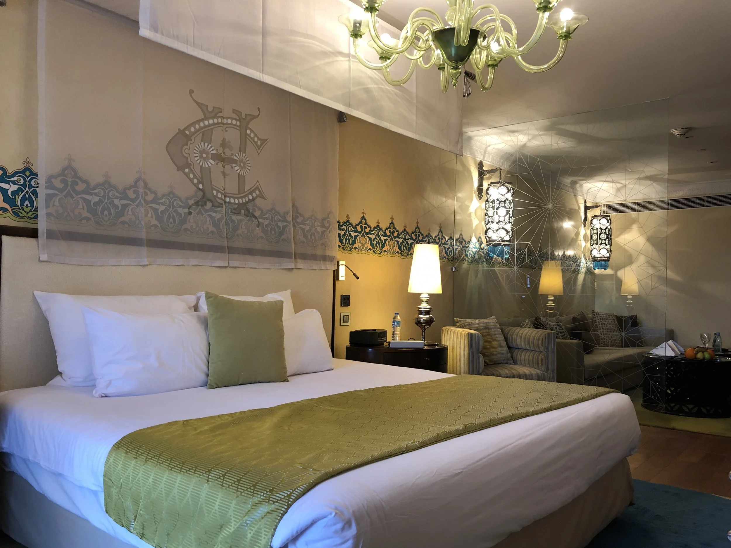Our bed, with the sitting area beyond