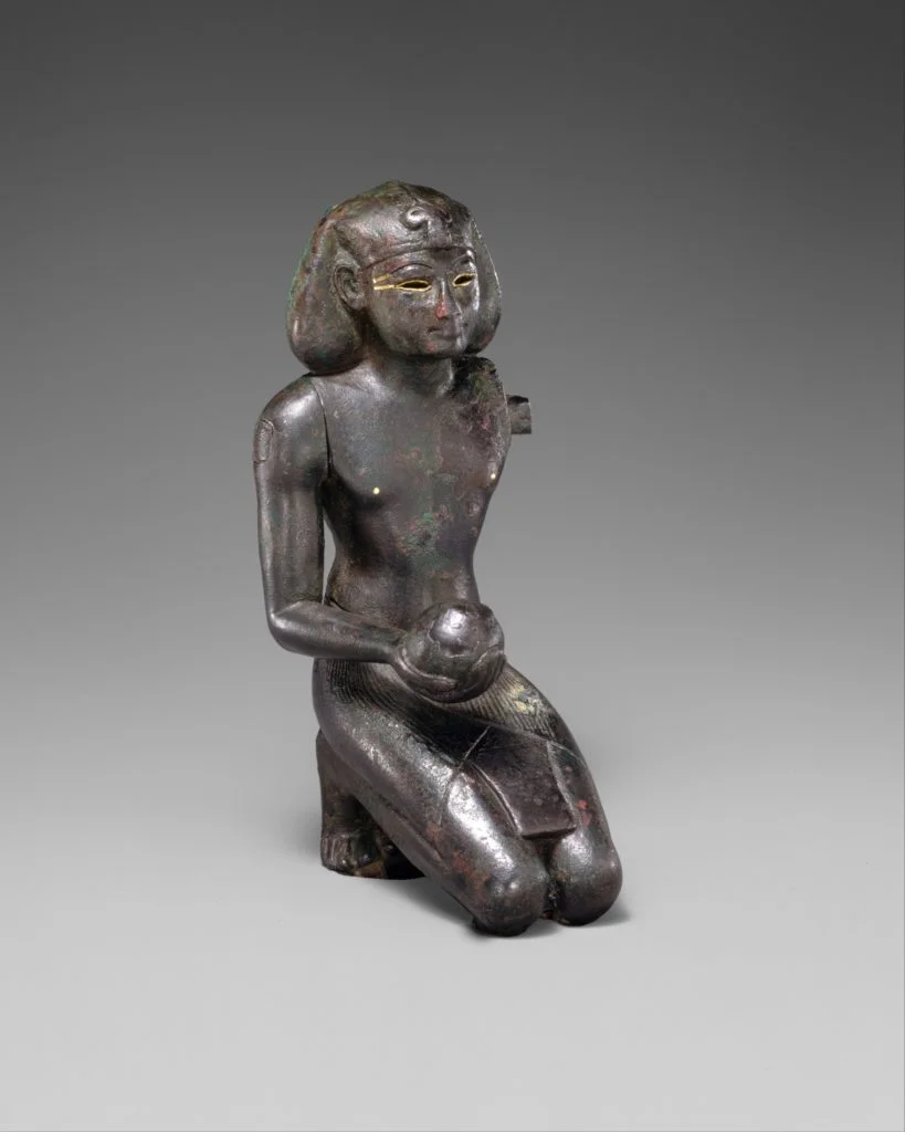 Thutmose III, shown in a devotional pose, must have asked the gods to secure the throne for his son