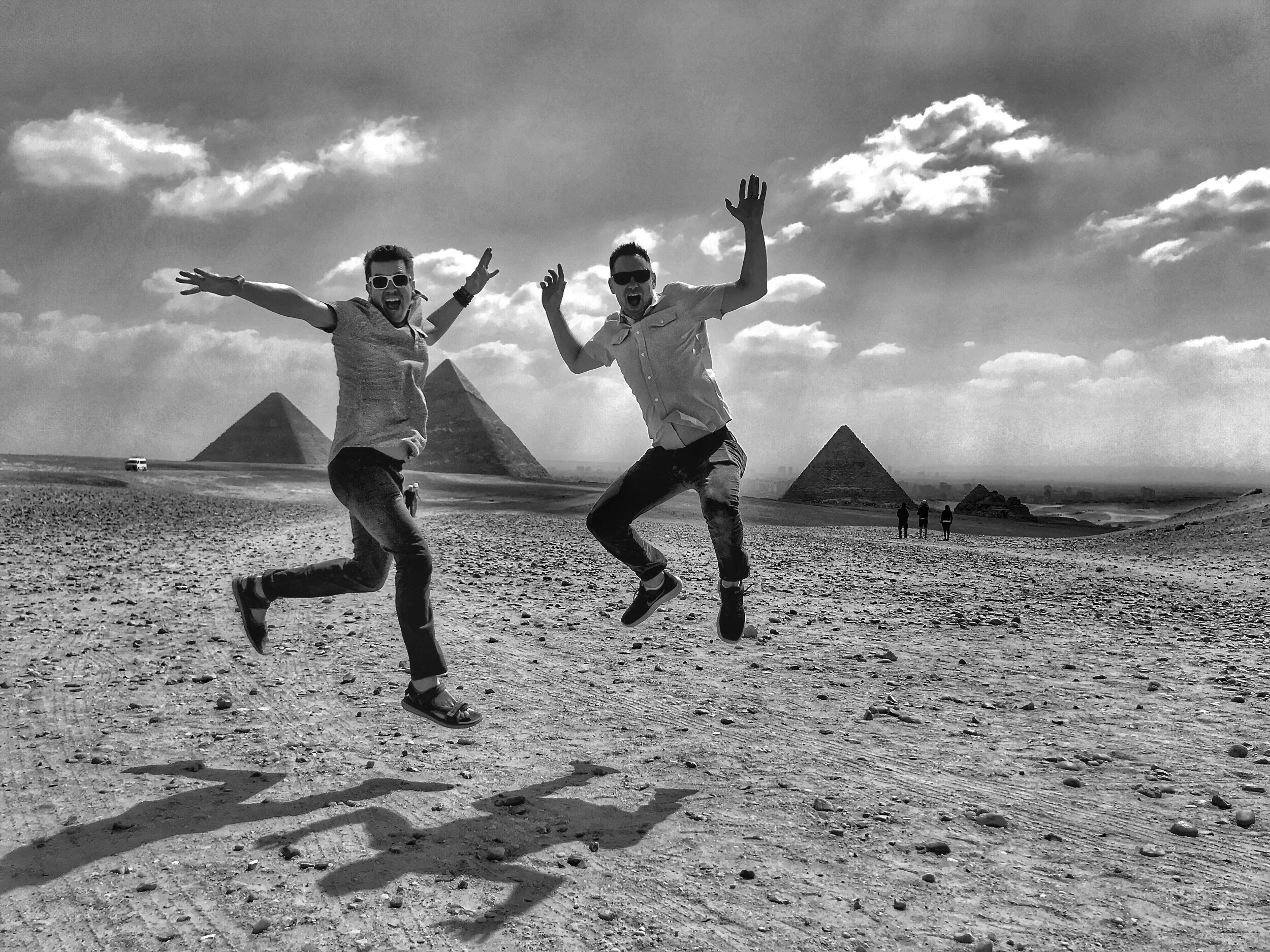 Wally and Duke pretend to jump for joy during their visit to the Giza Necropolis — but really their guide made the experience quite unpleasant