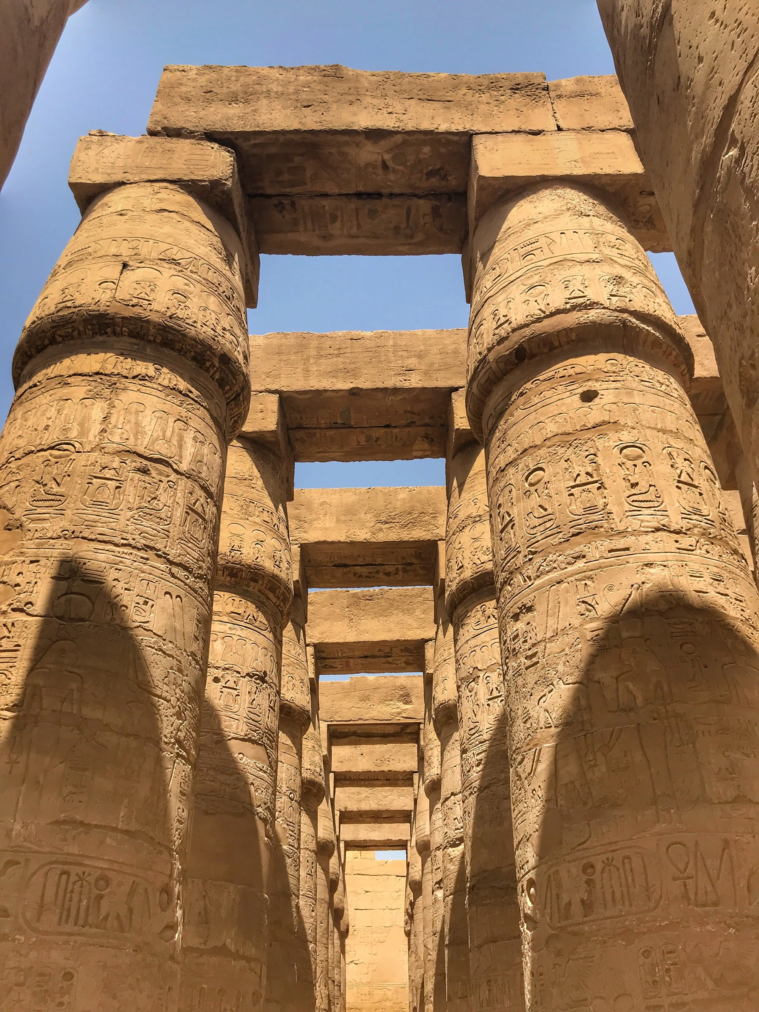 The open-air nature of the Great Hypostyle Hall hints at the worship of Amun as a sun god