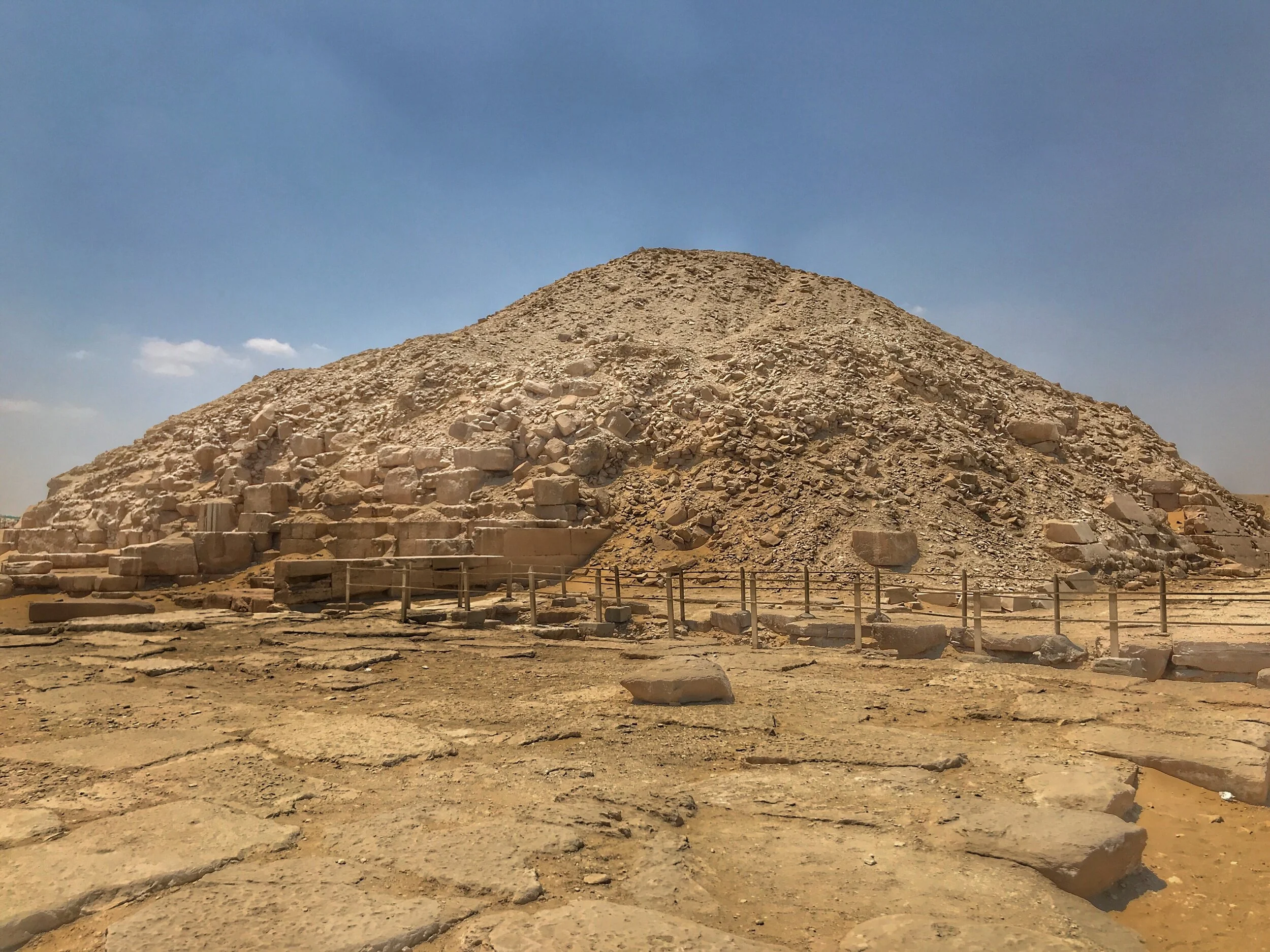 A small mountain of rubble and sand are all that’s left of the Pyramid of Unas — but you can explore the tomb carved beneath it