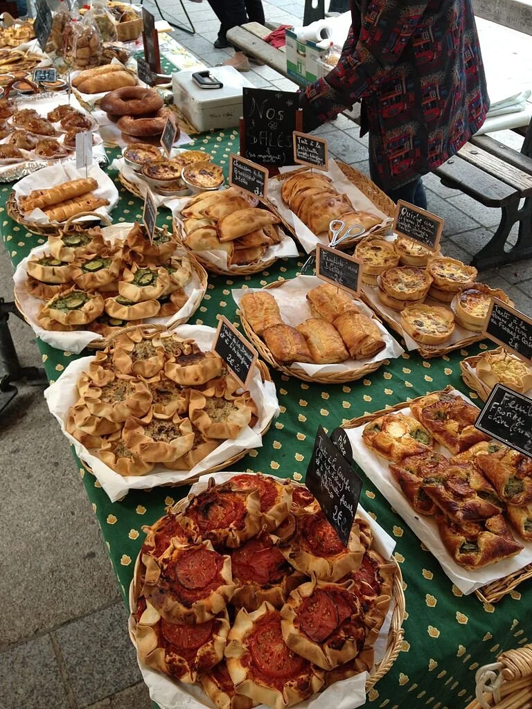 The cuisine of Corsica takes cues from France and Italy. If you’re lucky, you’ll happen upon a market of fresh-baked goods like this one.