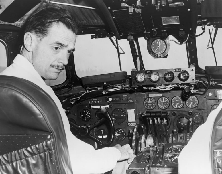 Howard Hughes in the cockpit of a TWA plane. He bought the airline and commission the construction of the Flight Center.