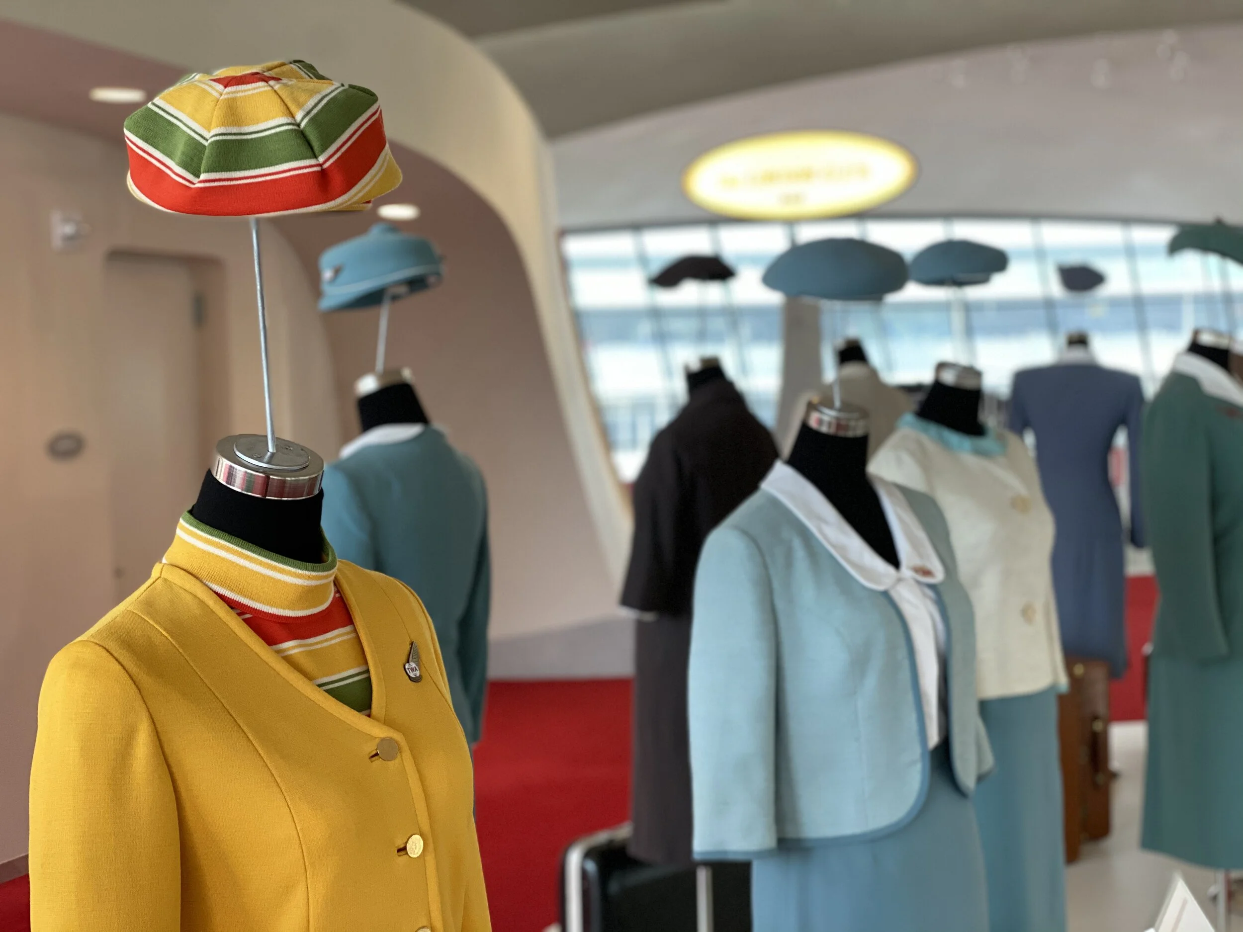Famous designers like Valentino designed flight attendant uniforms for TWA. They’re on display upstairs.