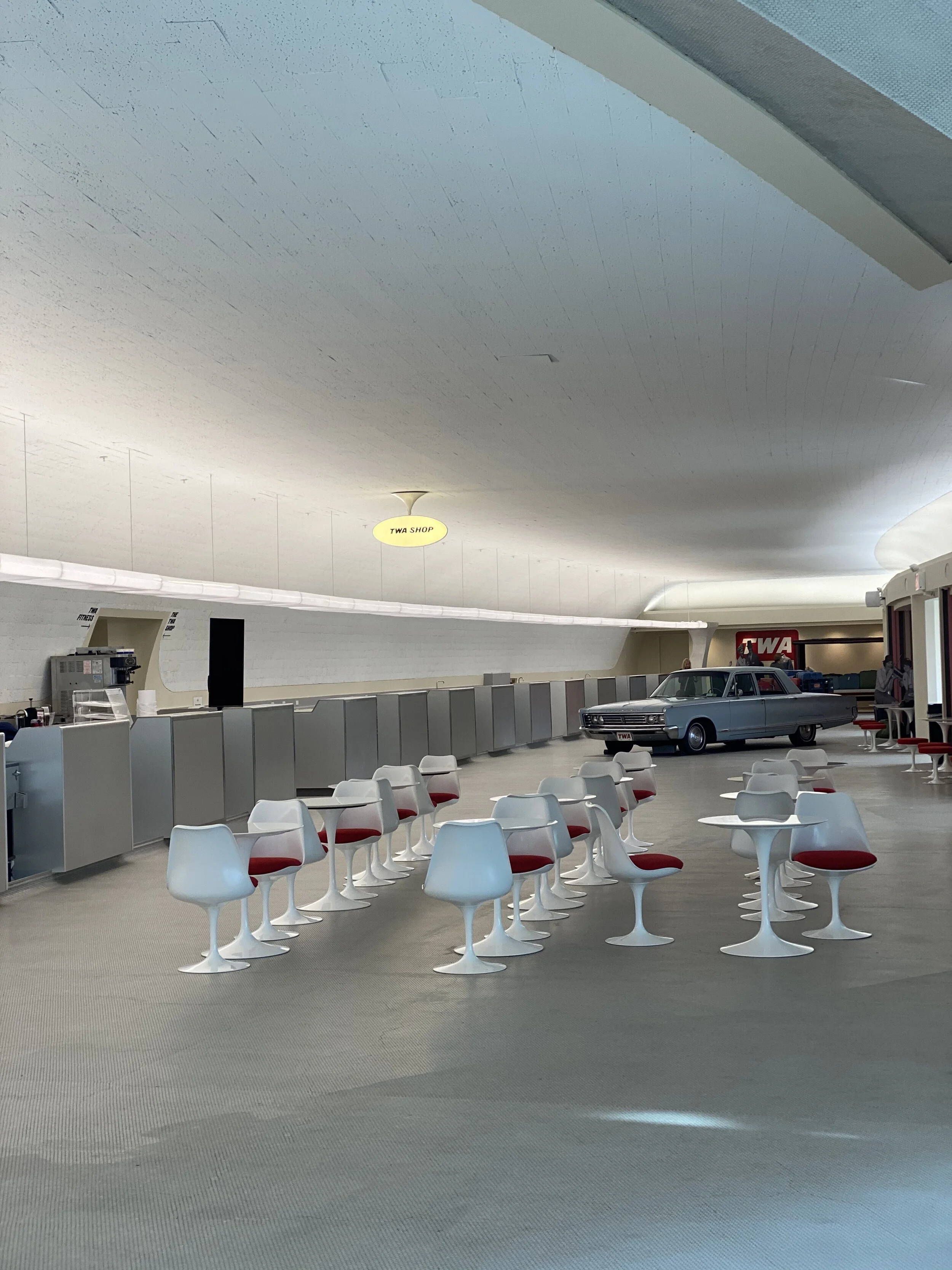 There’s an odd little seating area (with another classic car) off to the left when you enter.