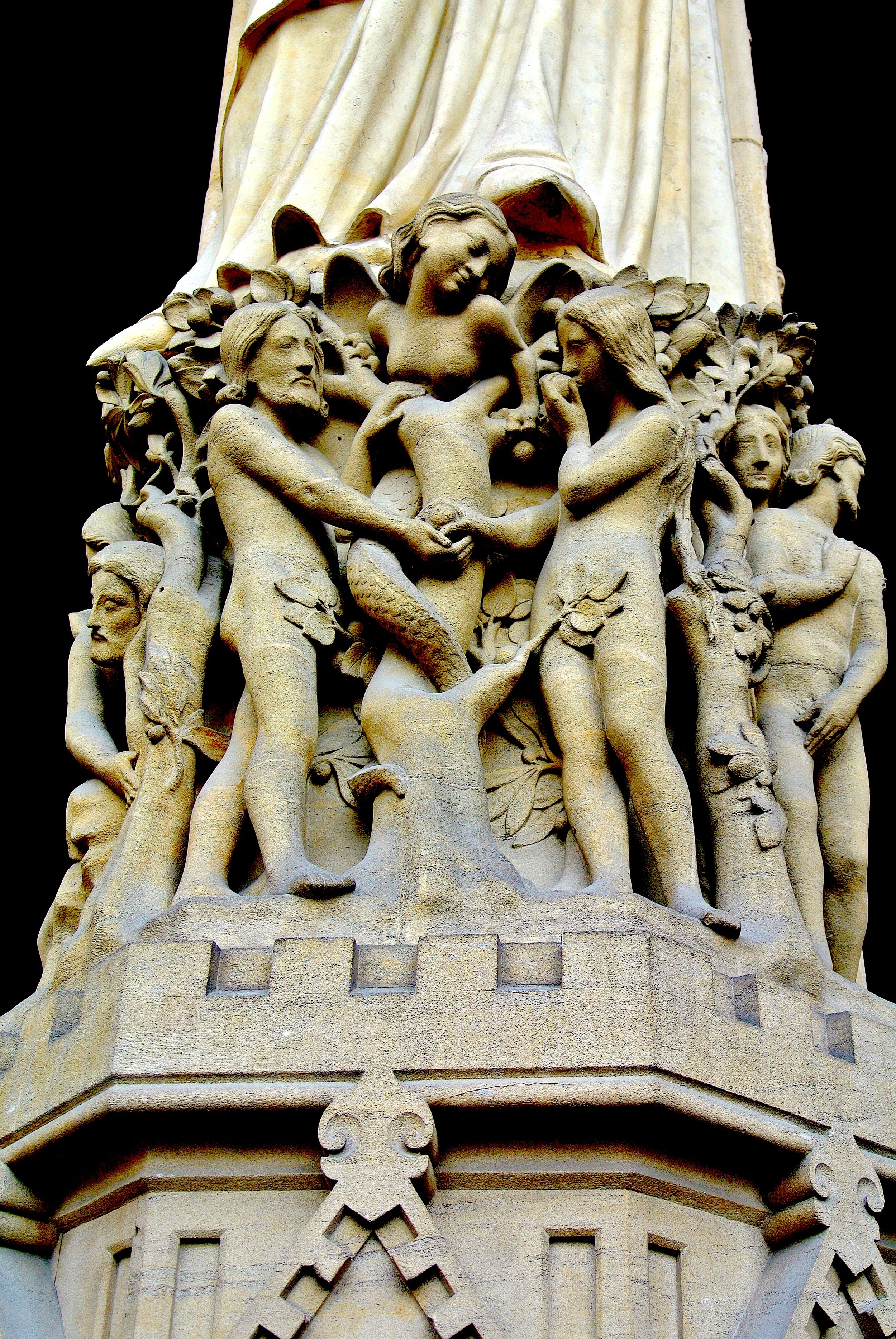 Adam and Eve — and the serpent, depicted as a temptress