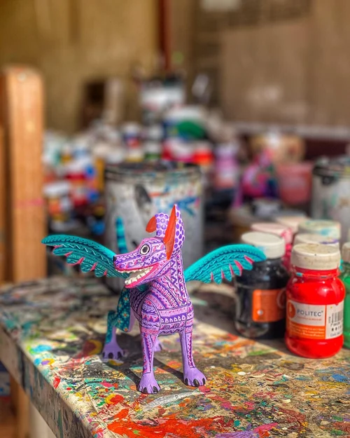 The colorful #fantastical #woodcarving creatures known as #alebrijes were inspired by an artist&rsquo;s fever dream. Learn more about our favorite #mexican #folkart #artepopular #handicraft. Link in bio. #travel #travelblogger #mexico🇲🇽 #oaxaca #
