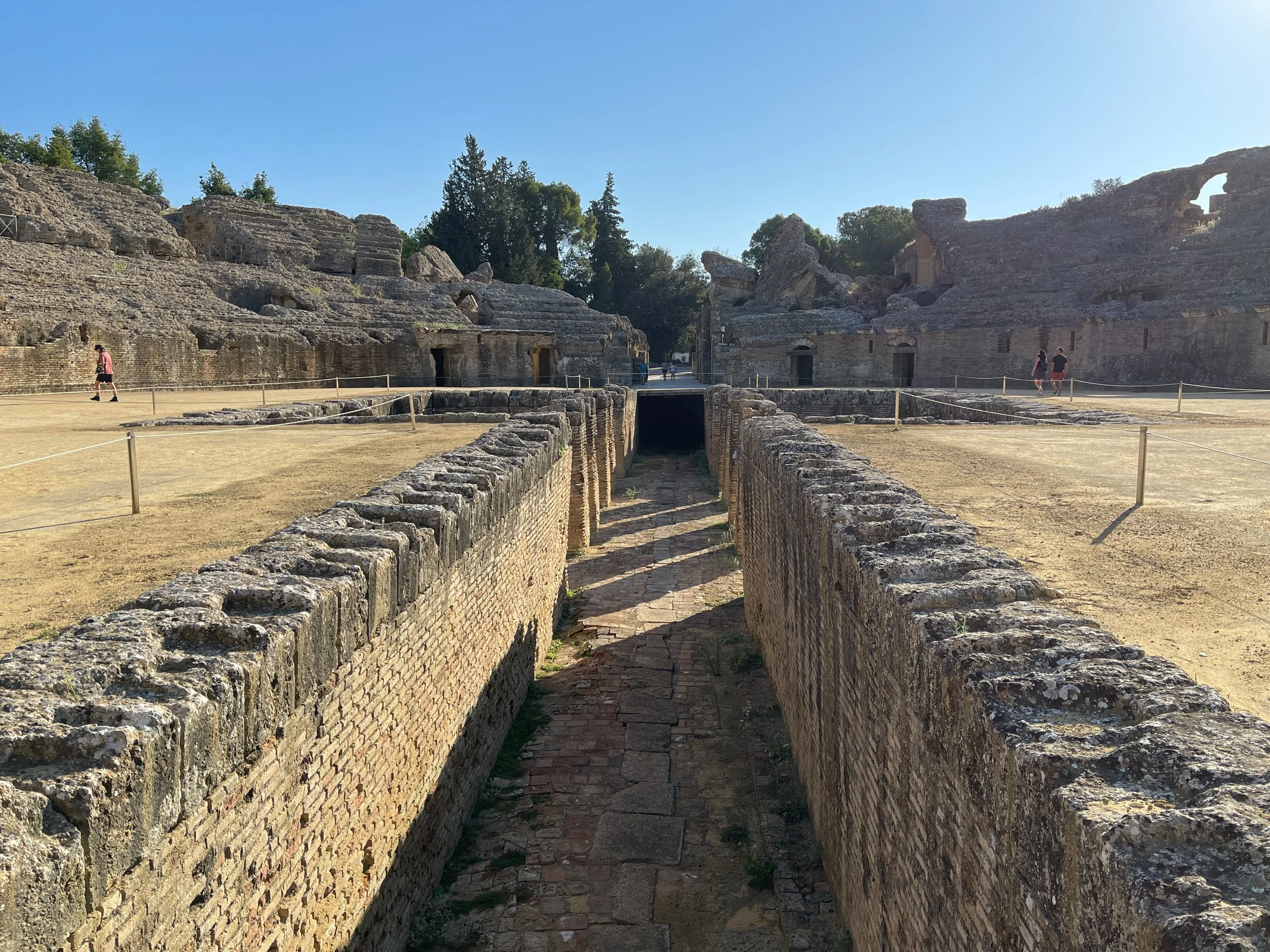 The pit at the amphitheater at Italica, Spain, a straight passageway dug into the floor of the arena