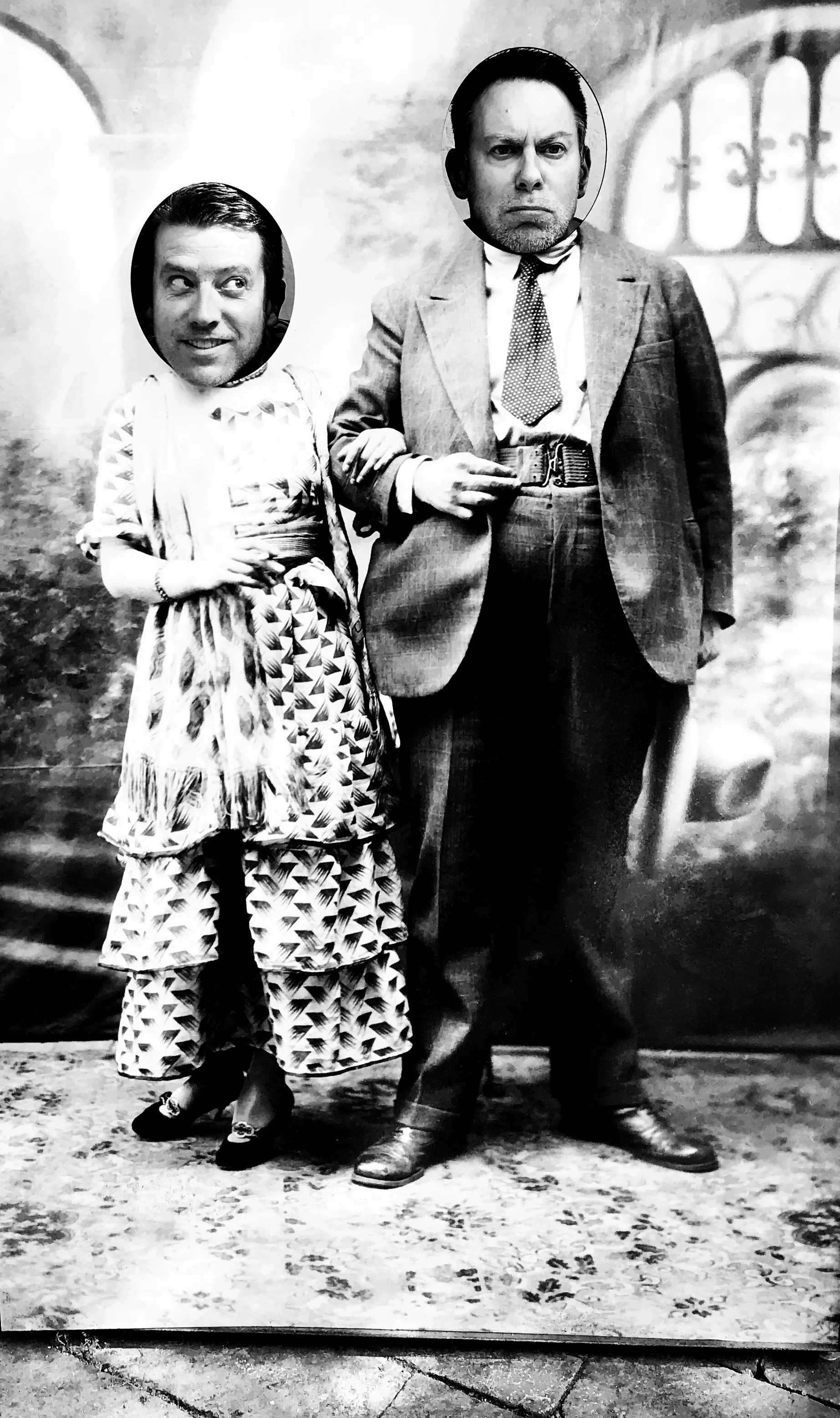 Wally and Duke pose in cutouts of Frida Kahlo and Diego Rivera