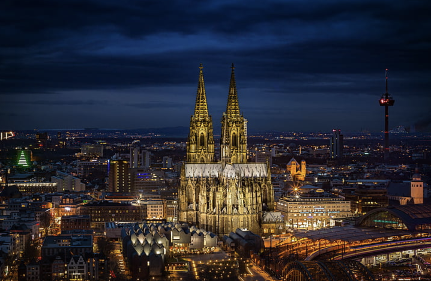 Cologne Cathedral and surrounding building in Koln, Germany, seen at night