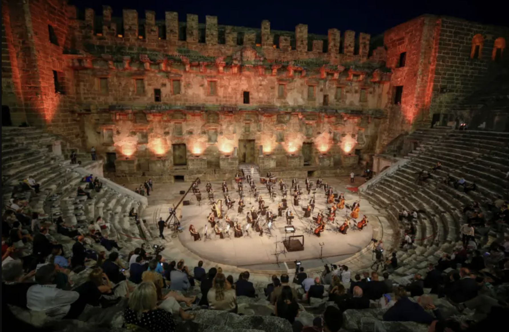 A nighttime musical performance at Aspendos Theater in Turkey