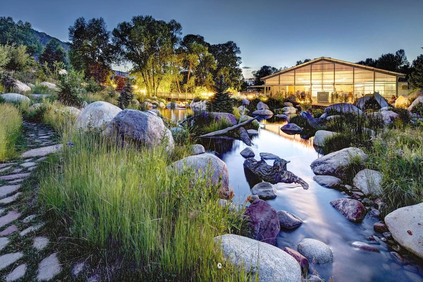 A creek and building for gatherings in Aspen, Colorado