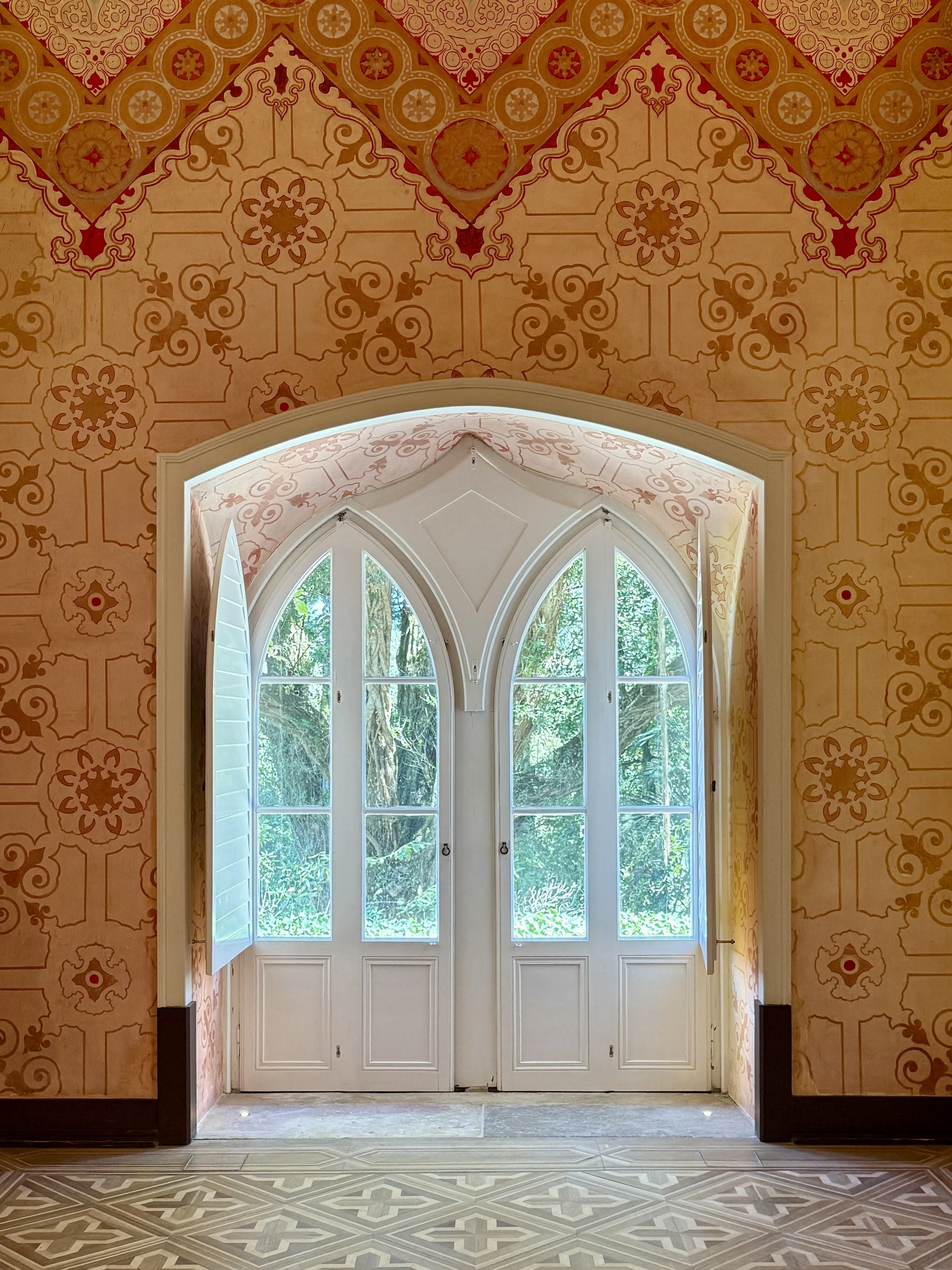 French doors lead out to the garden at the Chalet da Condessa d’Edla in Sintra, Portugal