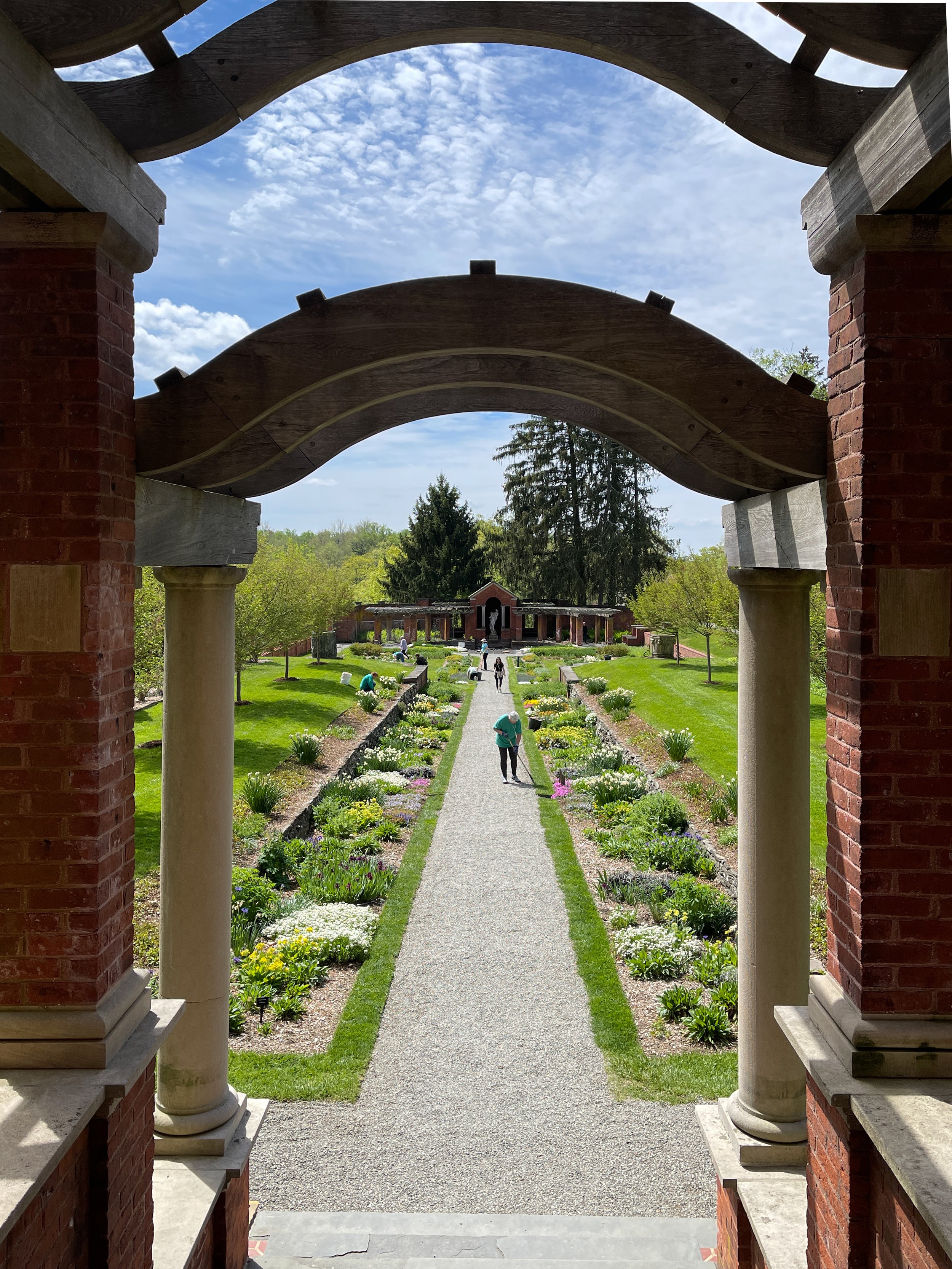 Arches looking down path in the formal gardens at Vanderbilt Mansion