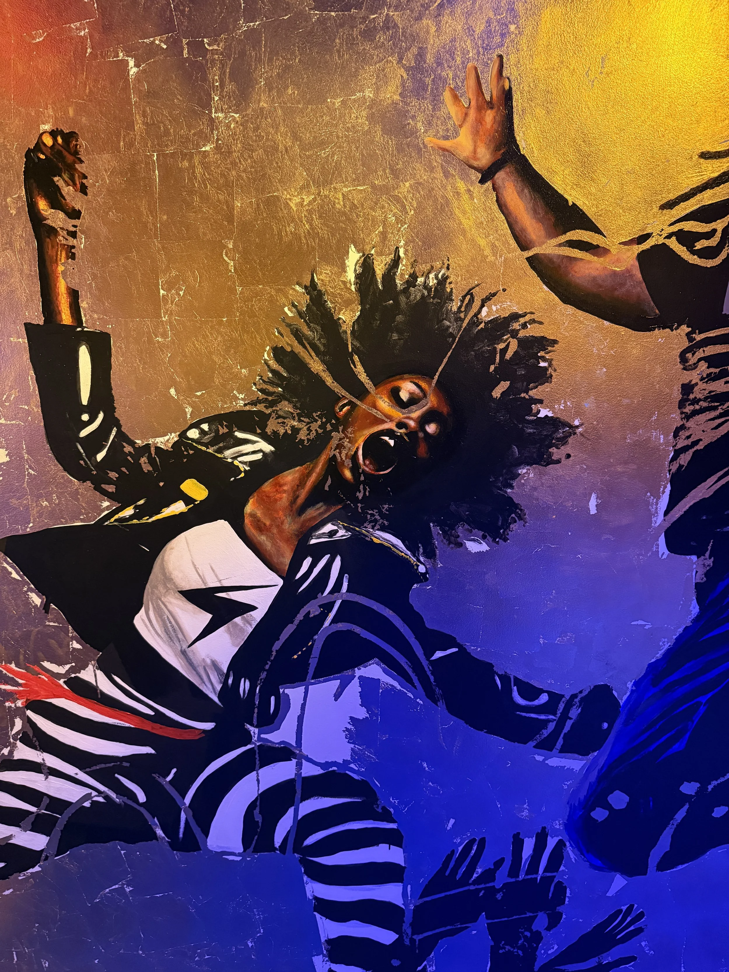 A cool chick dancing in a mural at Meow Wolf Radio Tave in Houston, Texas