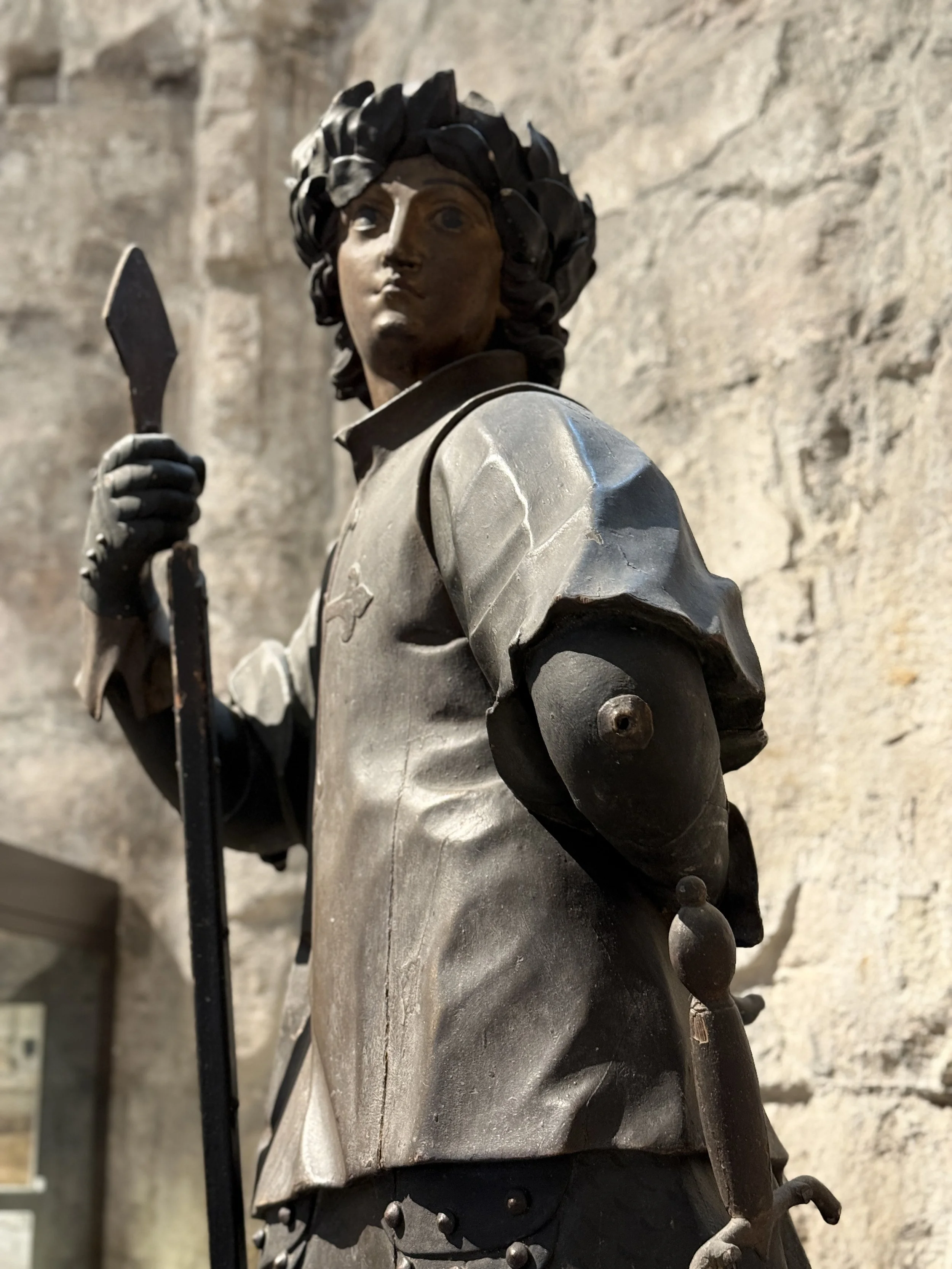 Statue of Nuno Álvares Pereira, later São Nuno de Santa Maria. Shown in armor and crowned with laurel, he holds a spear in one hand
