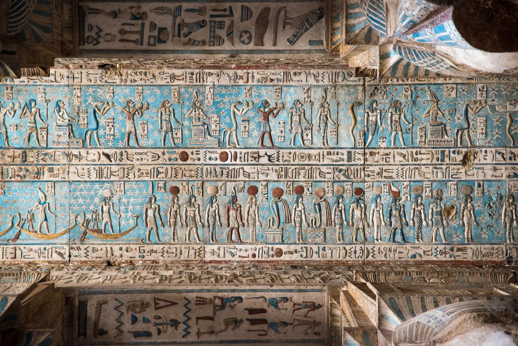 A bas-relief with blue paint on the ceiling of Dendara Temple in Egypt