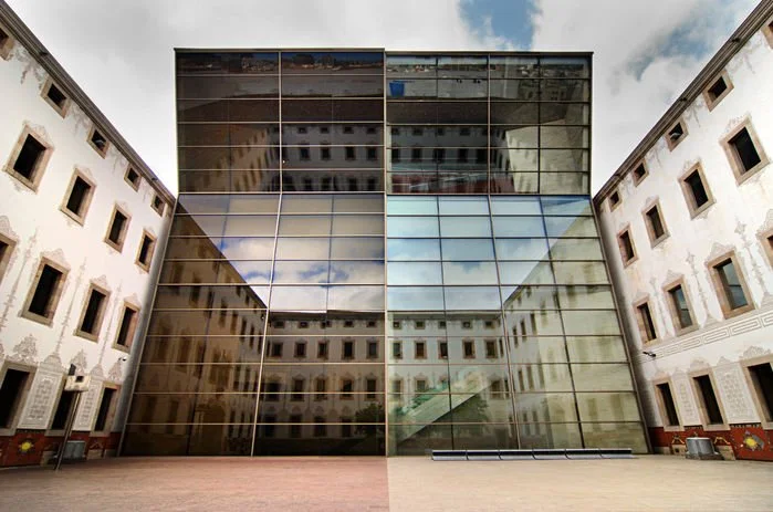 Glass and mirrored facade to the CCCB (Centre de Cultura Contemporània de Barcelona)