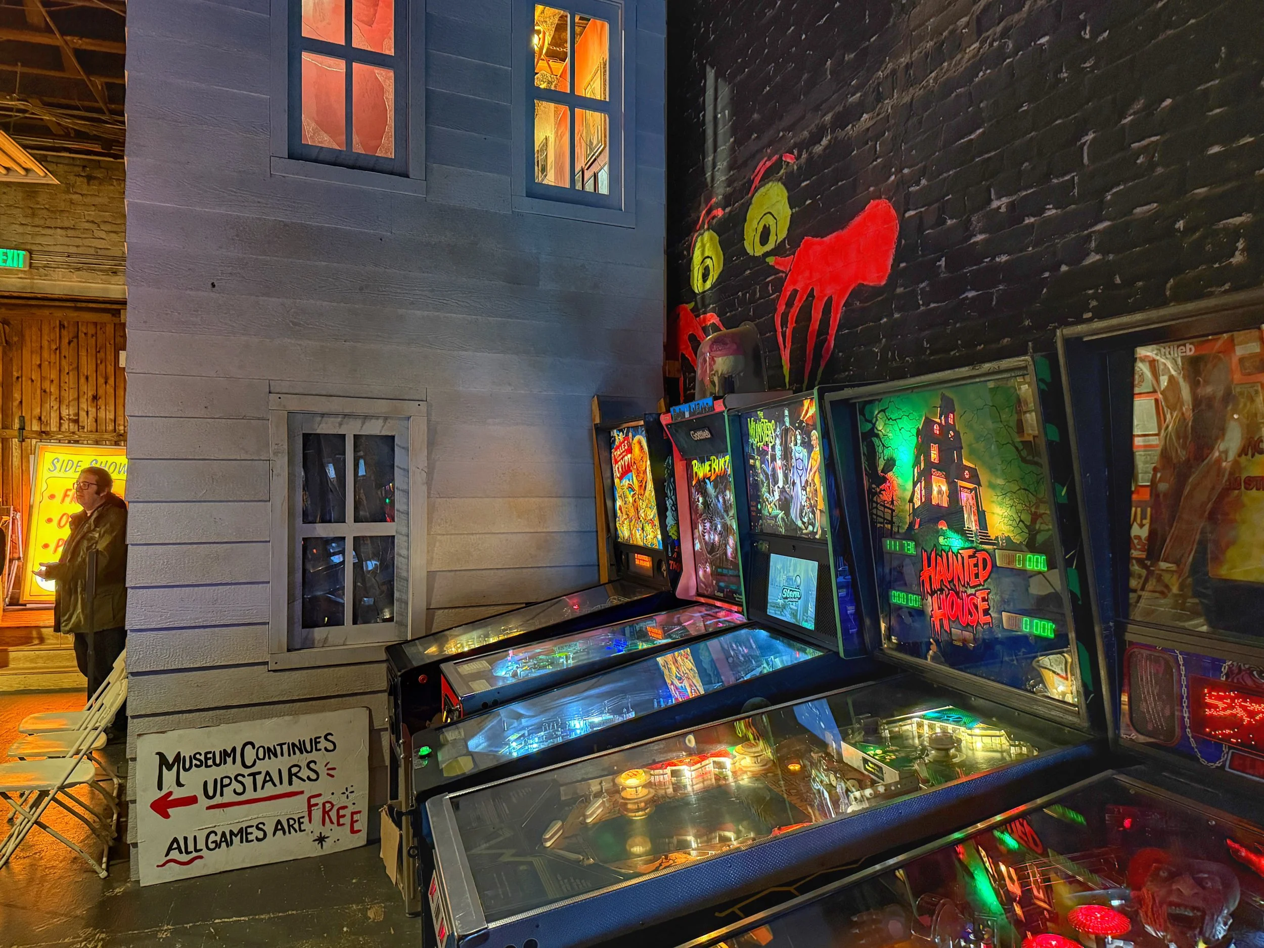Row of pinball machines inside the Graveface Museum in Savannah, GA