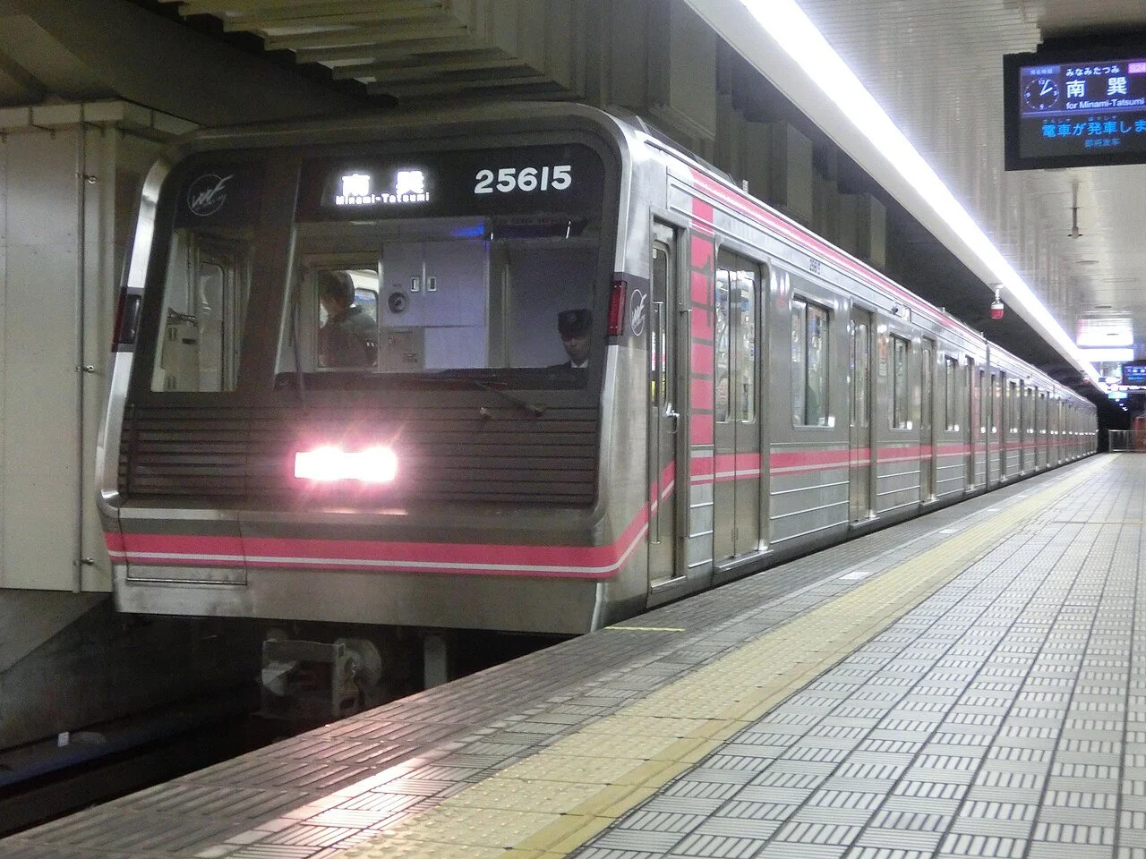 A subway train in Osaka, Japan approaches the station