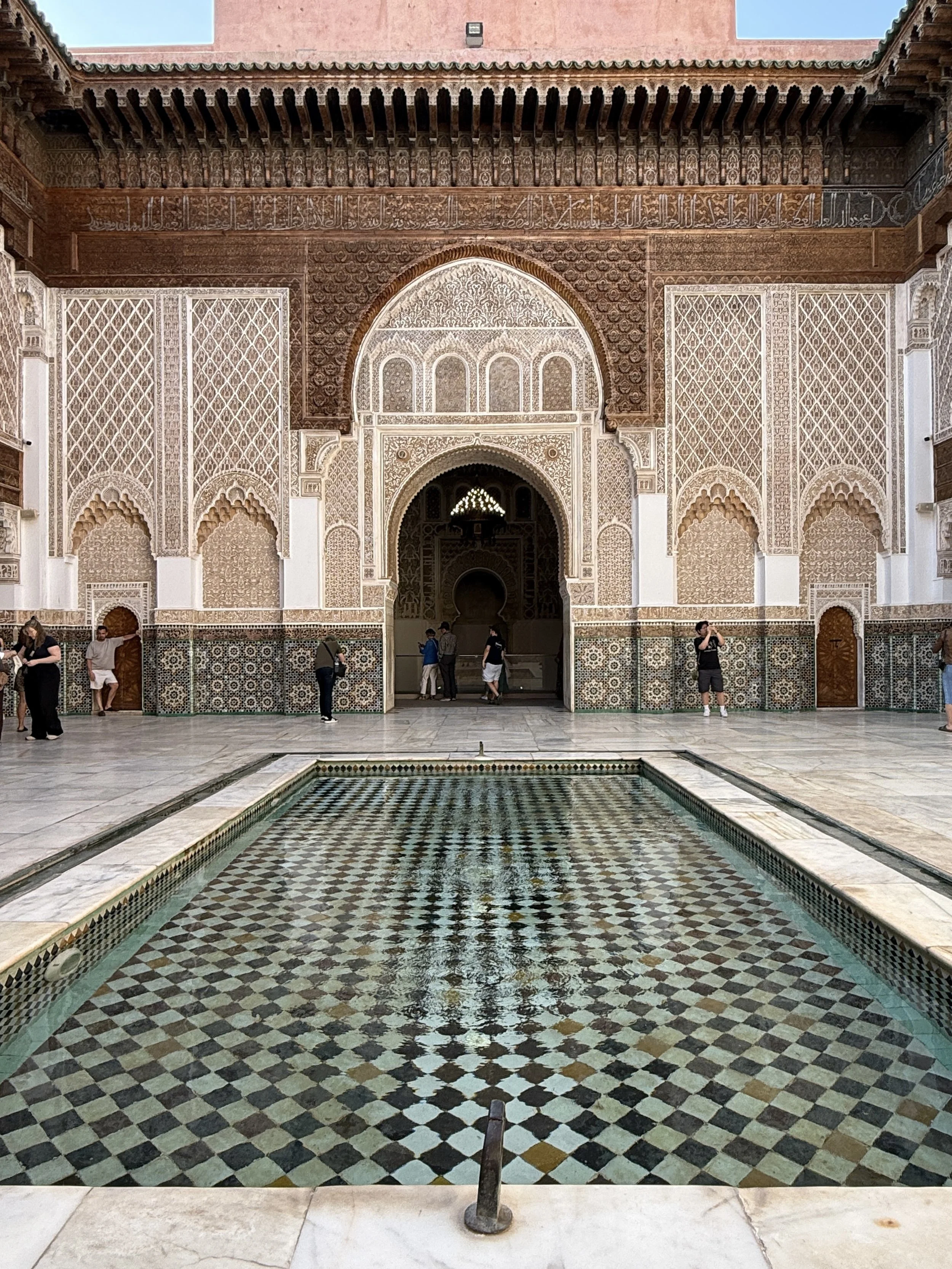 Courtyard of the Ben Youssef Madrasa with its reflecting pool in Marrakech, Morocco