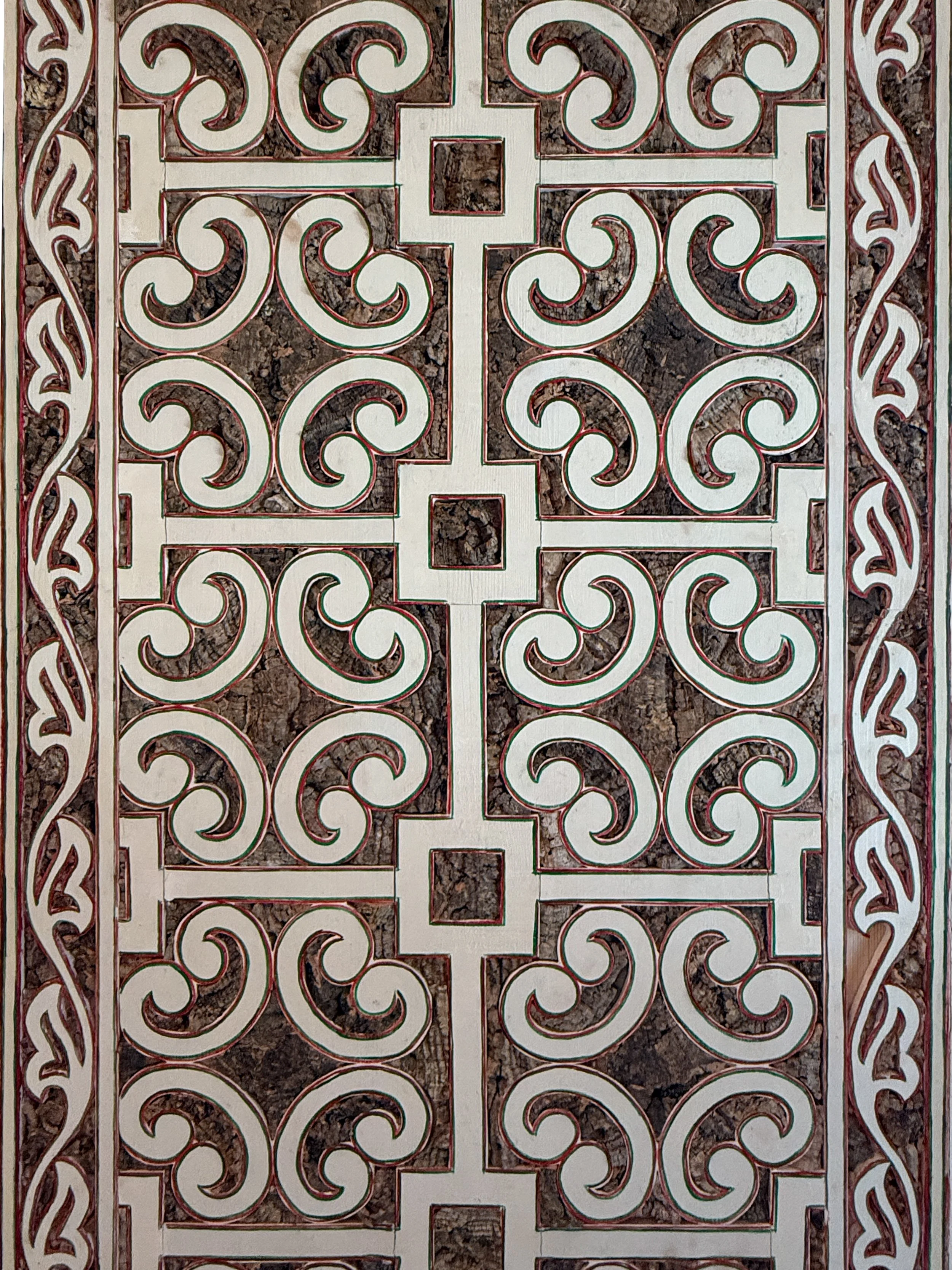 Cork-covered wall detail with elaborate patterns at the Chalet da Condessa d’Edla in Sintra