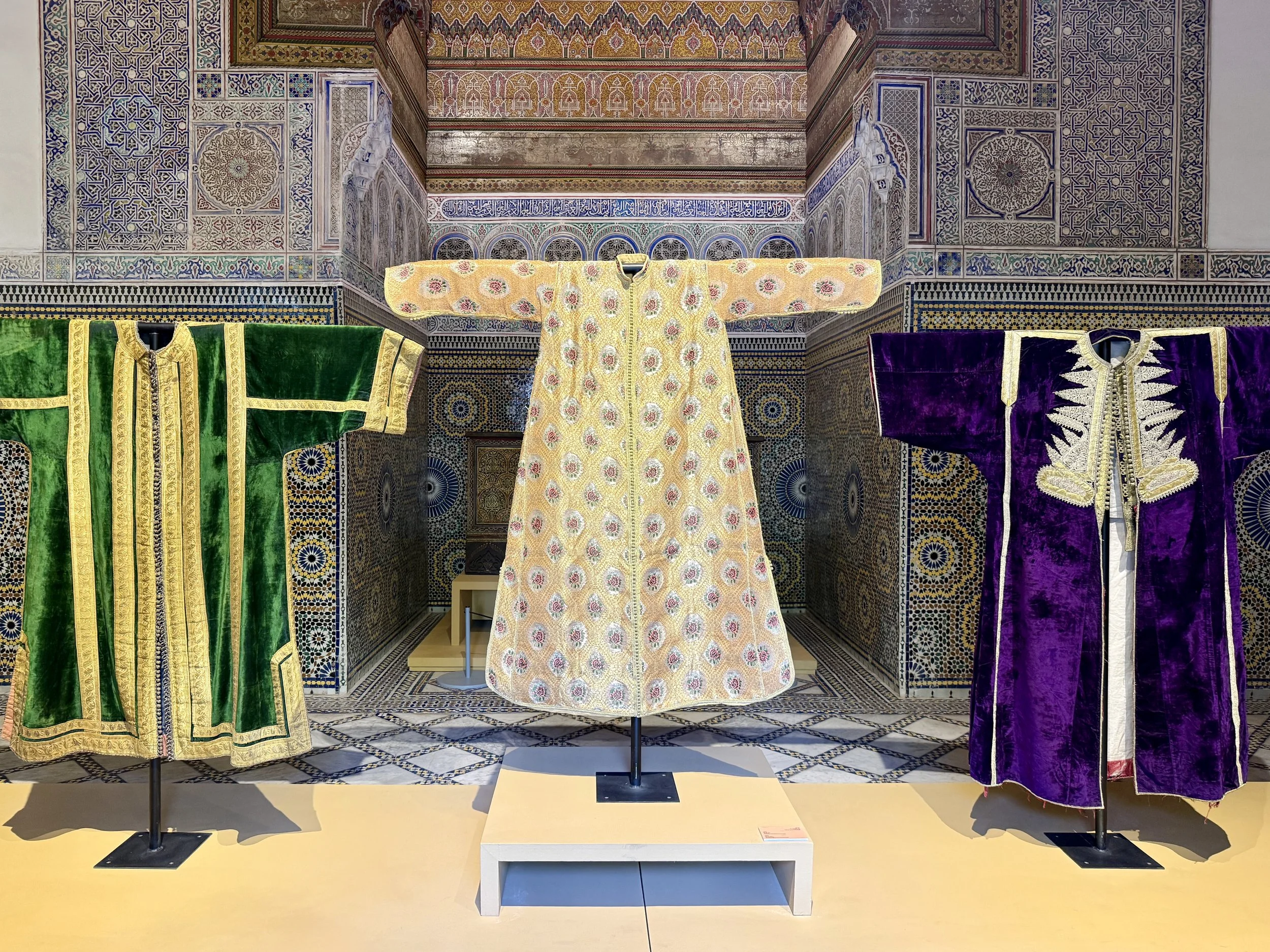 Caftans on display in one of the rooms at the museum in Dar el Bacha, Marrakech, Morocco