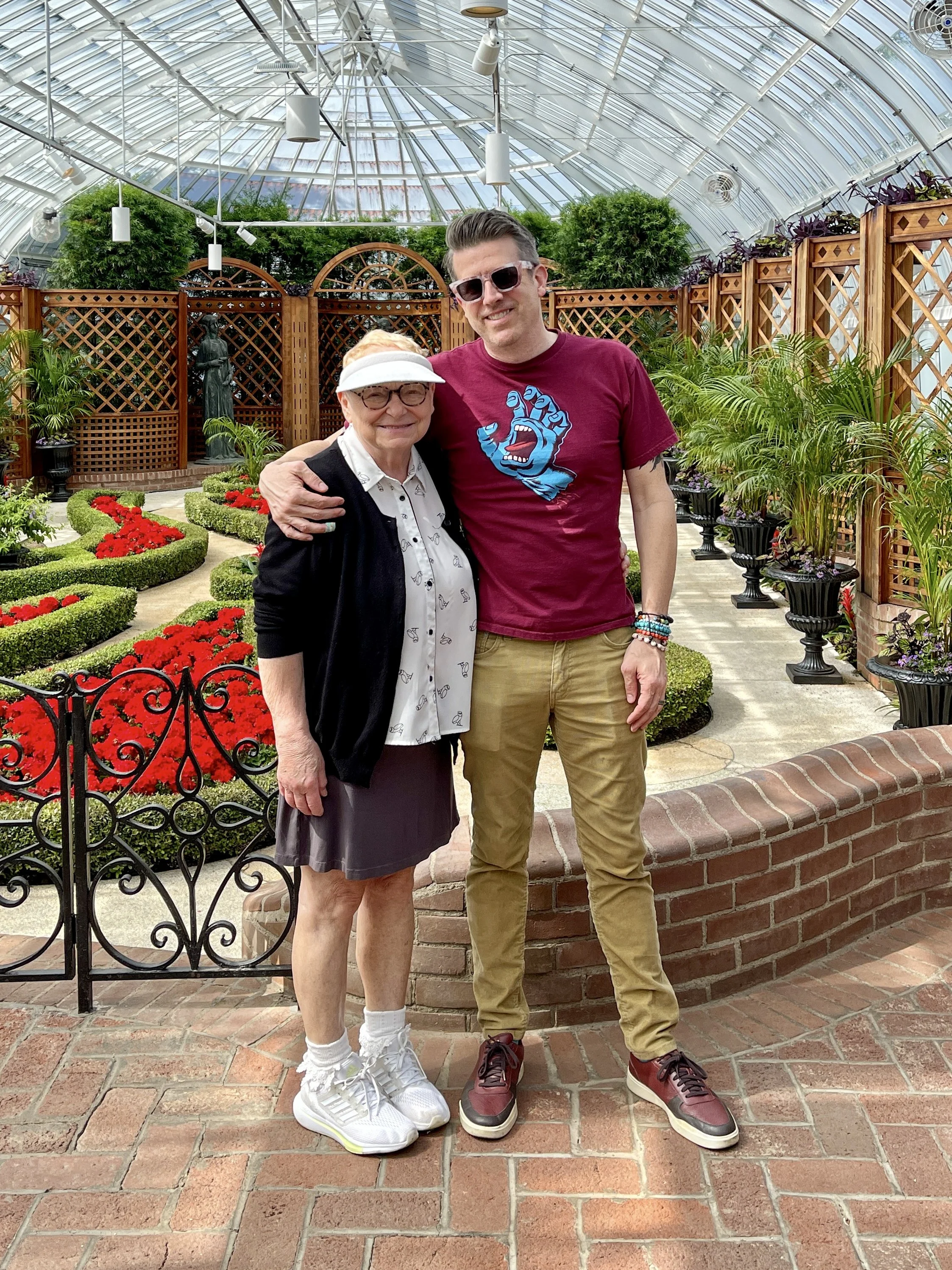 Woman and man in the Broderie Room at the Phipps