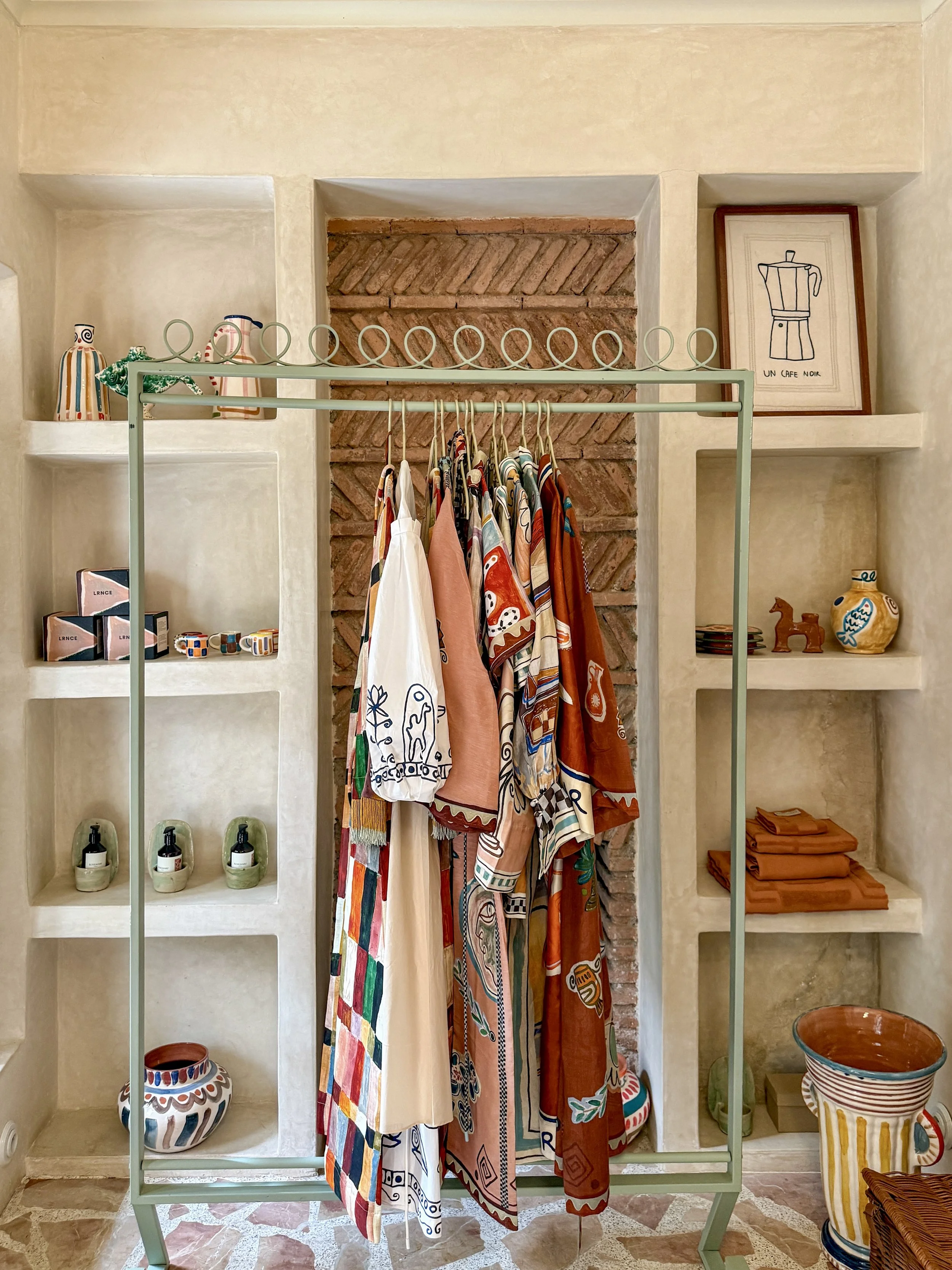 Hand-painted ceramics, embroidered bed linens, toiletries and apparel at the onsite boutique at Riad Rosemary in Marrakech