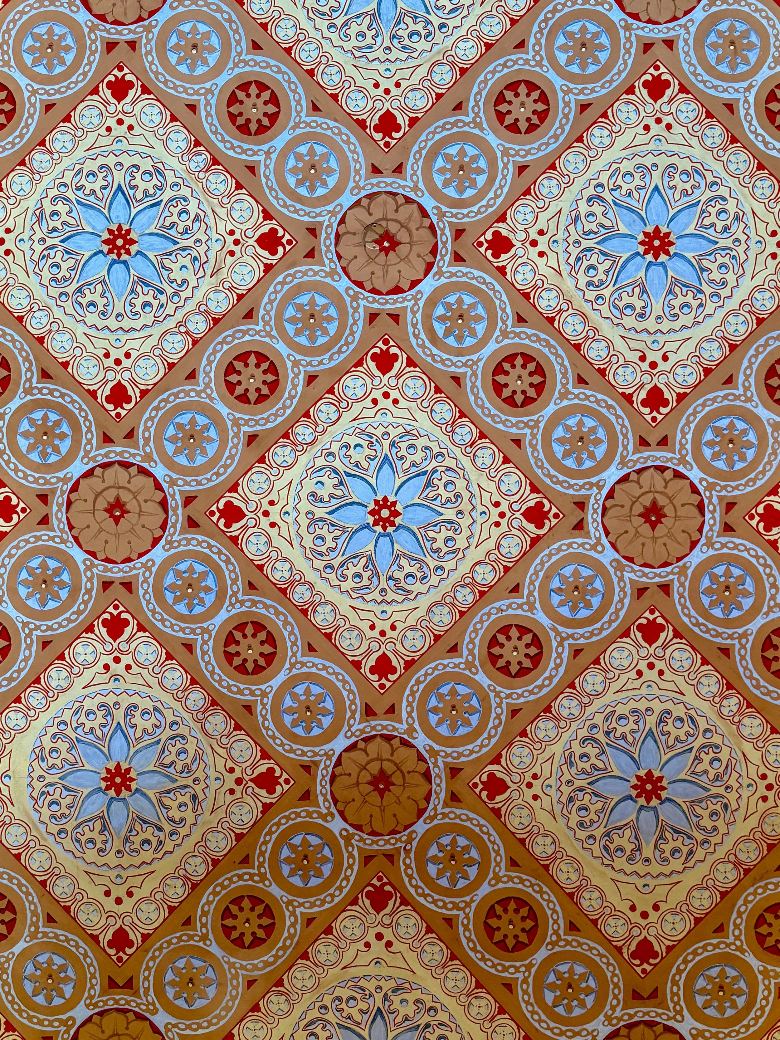 A colorful detail from a ceiling at the Chalet da Condessa d’Edla in Sintra, Portugal