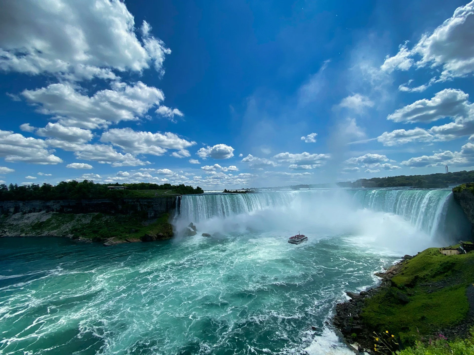A boat gets near the base of Niagara Falls