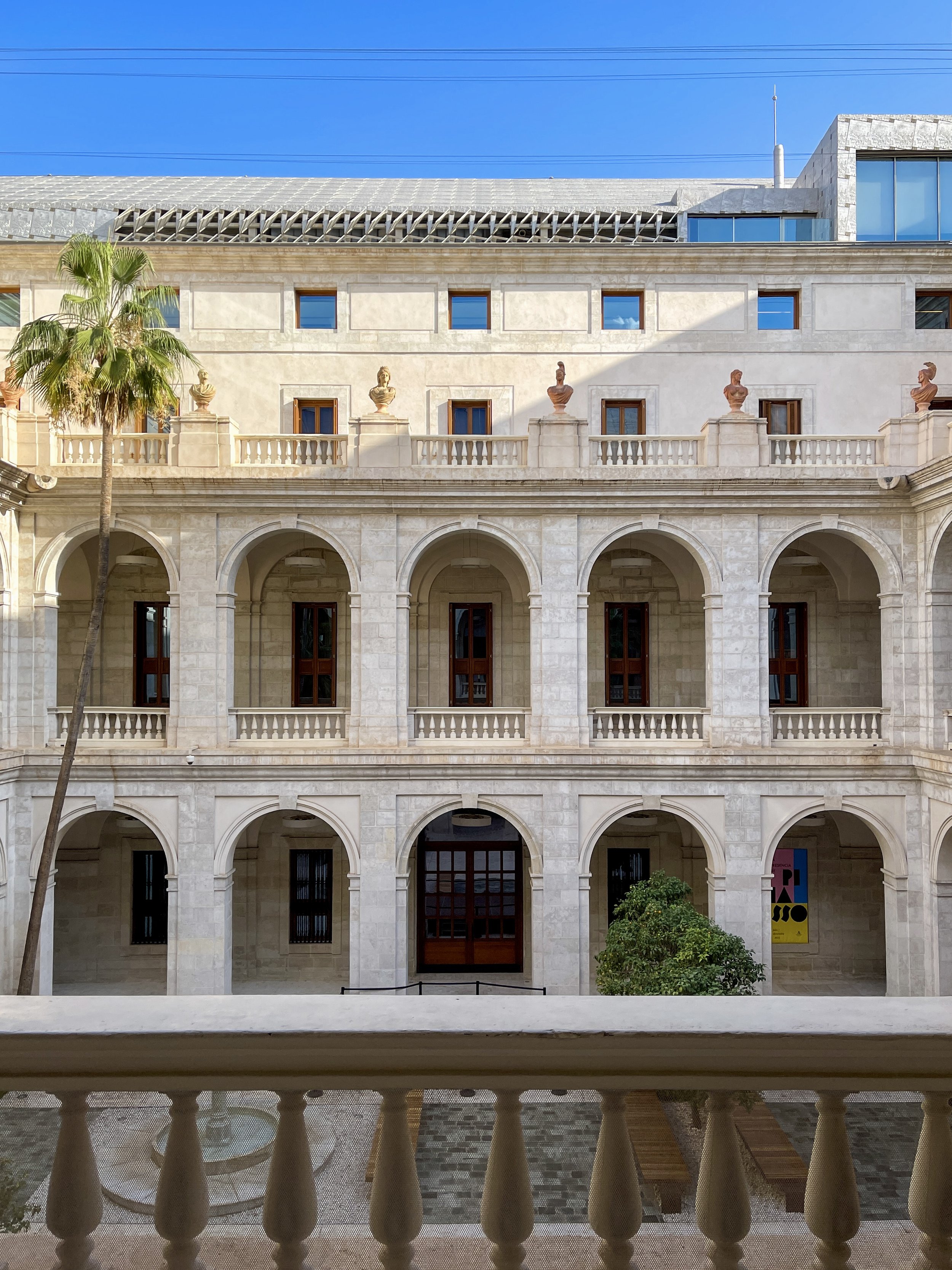 A view of the palatial courtyard of the Museum of Málaga with terracotta busts