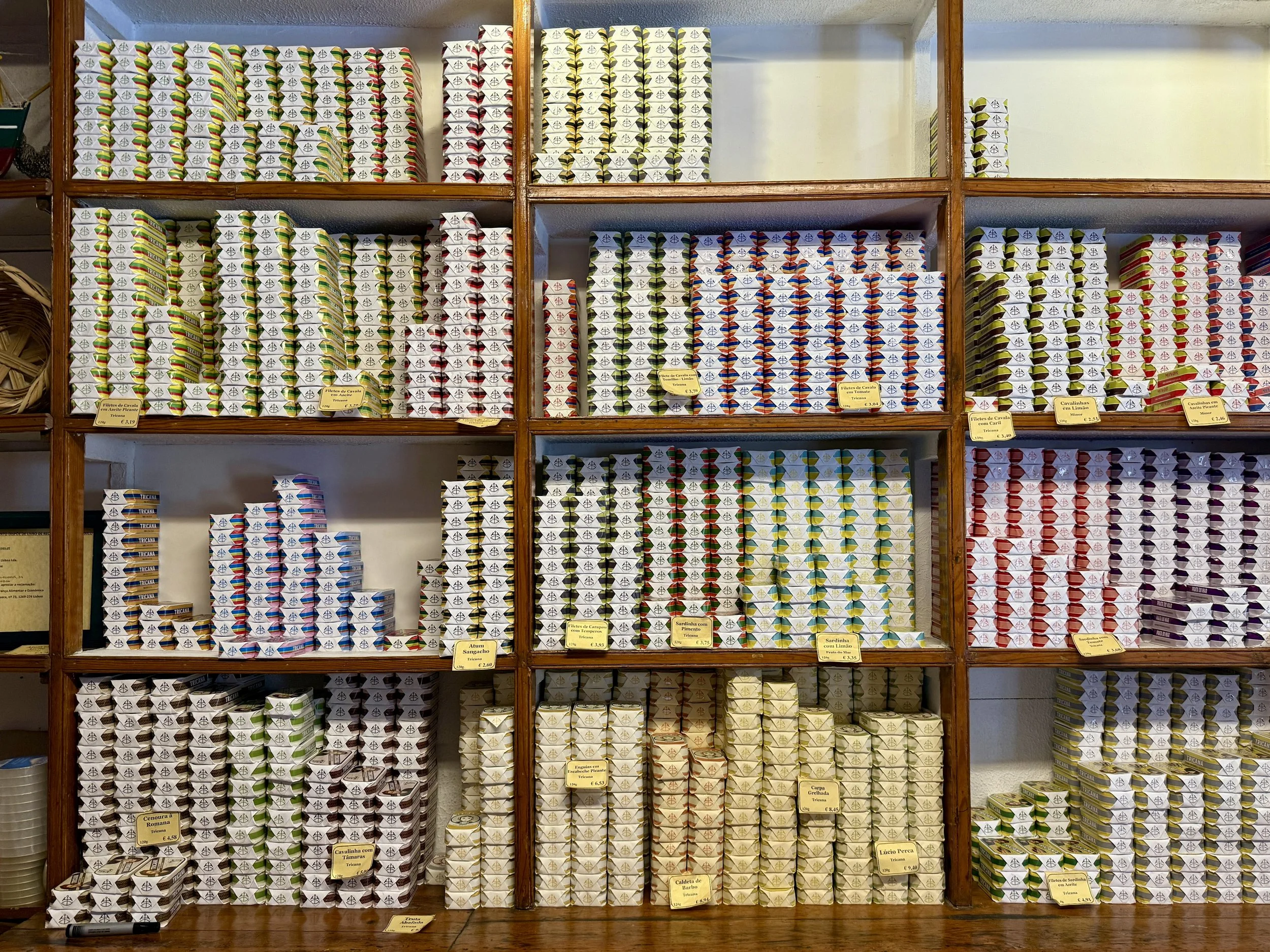 The shelves of Conserveira de Lisboa are lined with a dazzling array of colorfully packaged tins of sardines, mackerel, tuna and more.