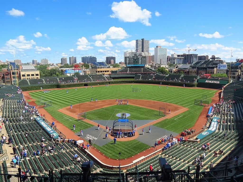 Looking down on Wrigley Field with building of Chicago in the background