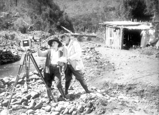 Photo of Louise Lovely directing on set for 'Jewelled Nights' 1925. Image from the National Film and Sound Archive Australia