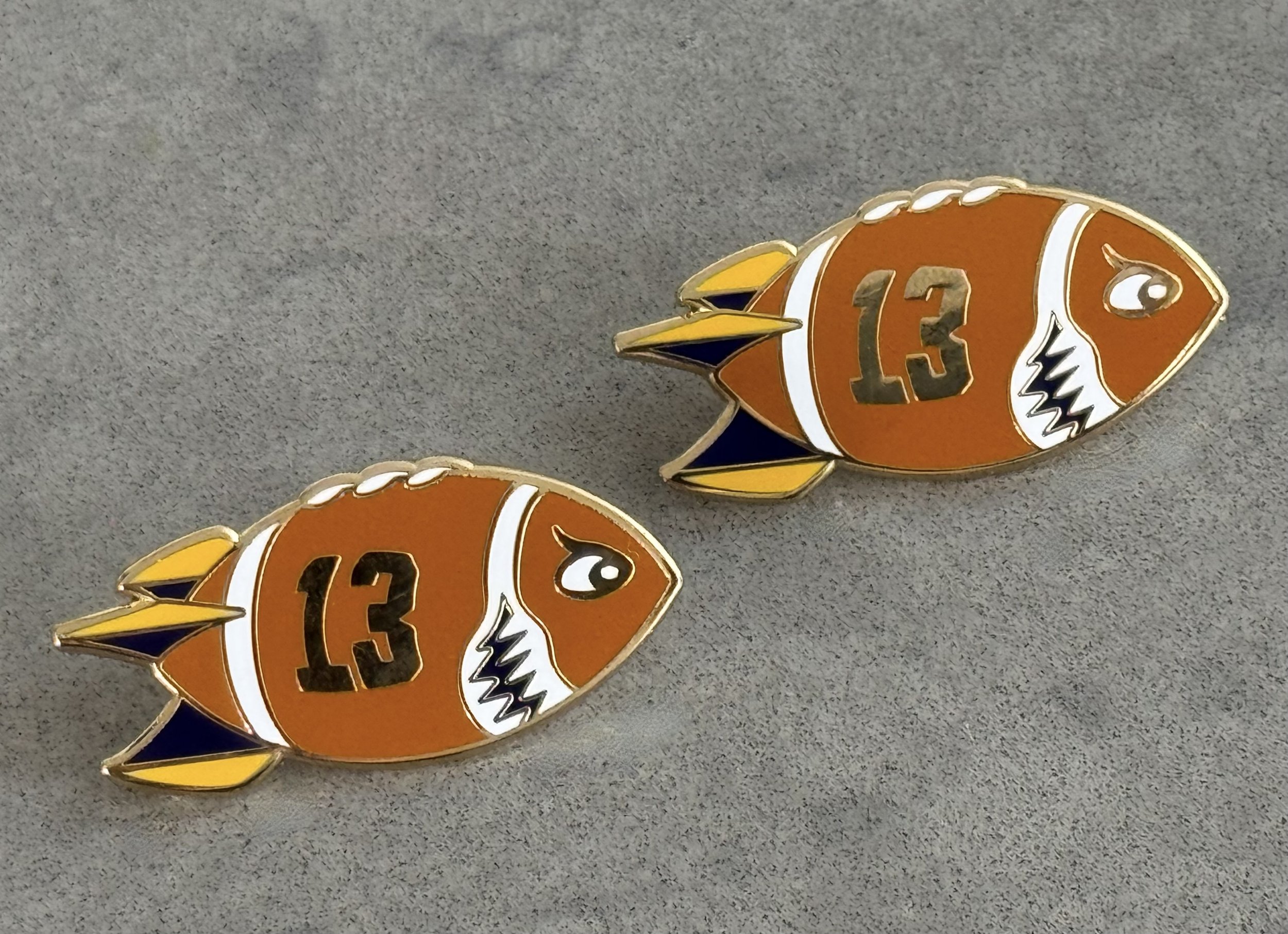 CJ Carr-BOMB lapel pin set