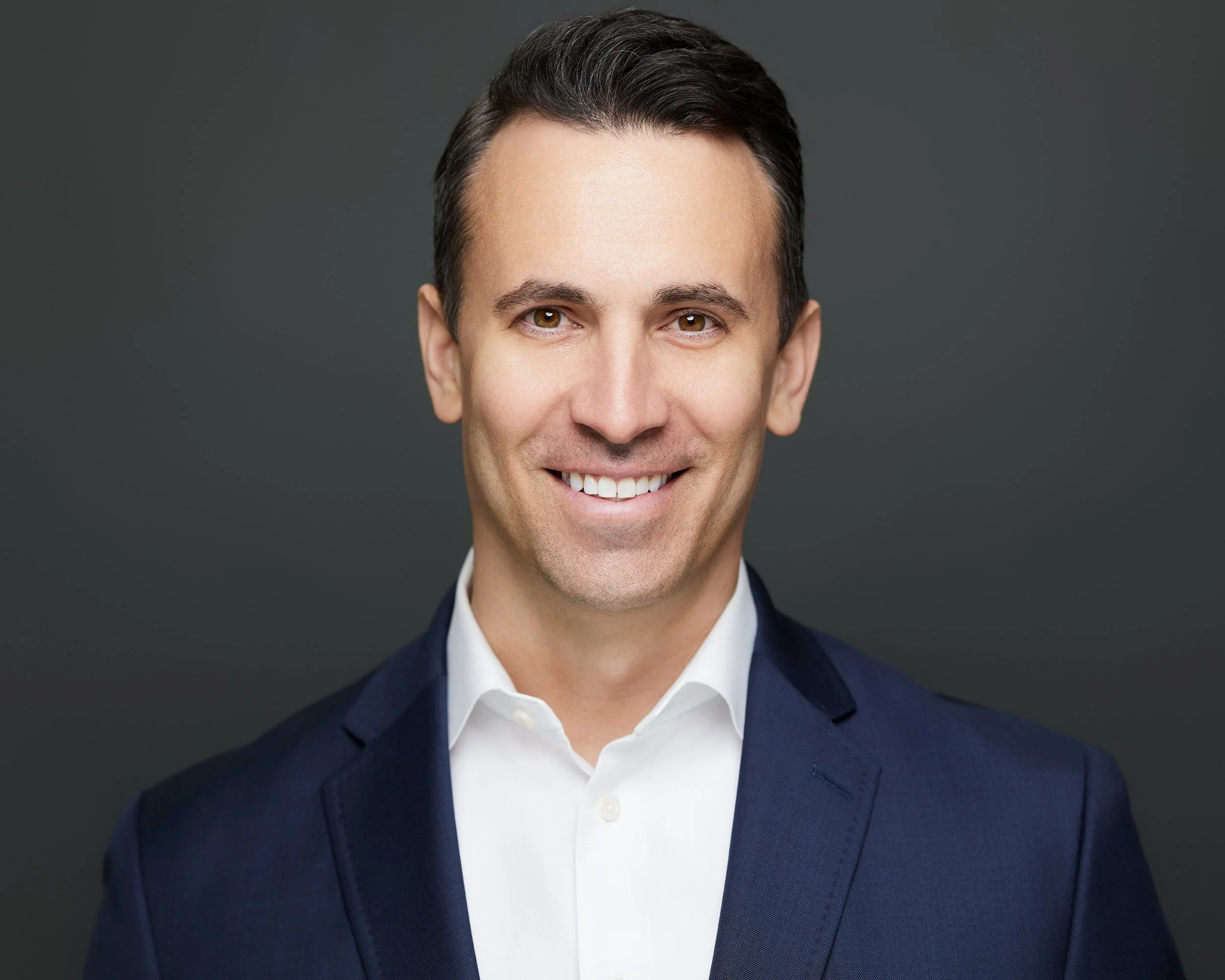Premium professional LinkedIn headshot of a Charlotte financial advisor by mjwphoto