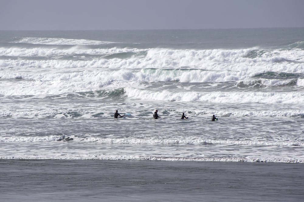 Surfers in the Pacific