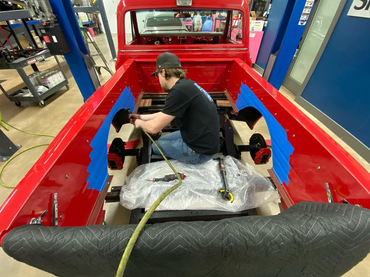 Keenan is making room for  wider wheel and tire combo on this step side c10. He narrowed a set of steel tubs that will bolt in like factory over the wood bed. #hardworkpaysoff #gofastorgohome #keenan #nash #hons #1969 #c10 #chevrolet #fabshop #fabric