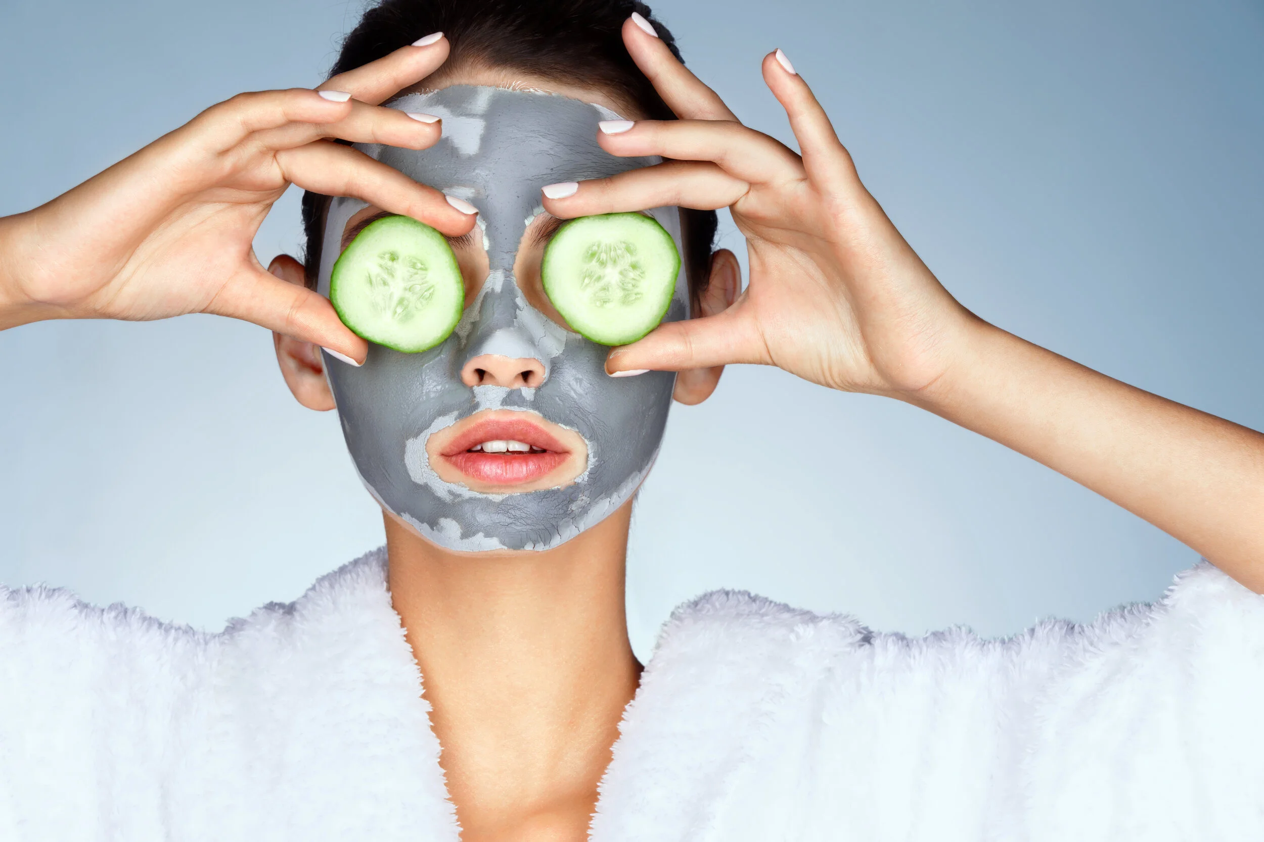 How do facials reduce the signs of aging?