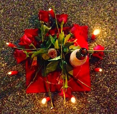 Offerings made outdoors to a Pomba Gira spirit in the tradition of Brazilian Quimbanda. 