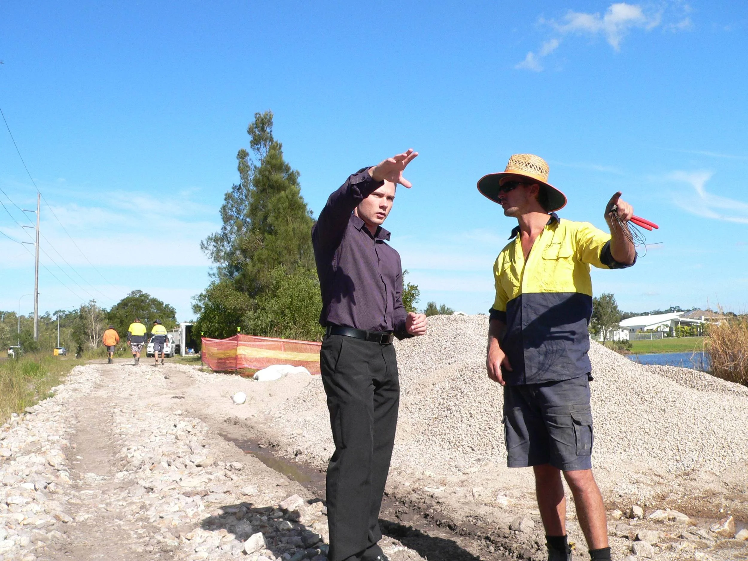 Construction worker Freddie explains how the culverts will work.jpg