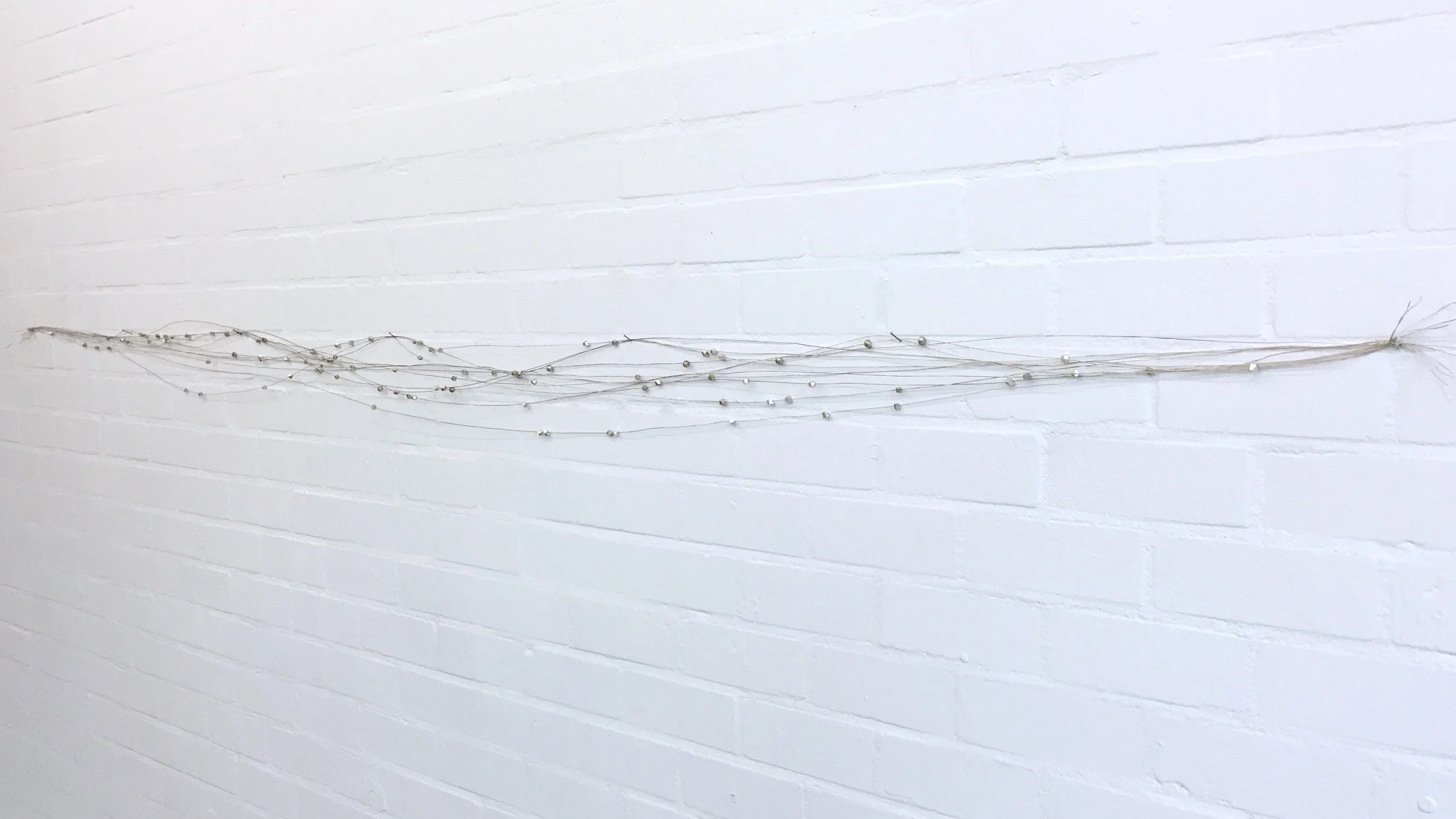 io/io/io/io , roib, Délia Sheehy, and Marcella.B (silver wire, and silver pearls), 2015. detail, Joey Ramone Gallery , Rotterdam . photo: Paulo Sudo.