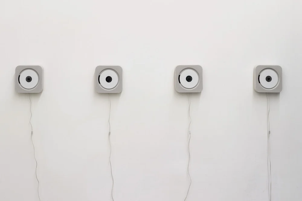 The White Coats (1-9) , Lima Drib, Martn and Christl Coppens, and Innumerat Roselare, voice by Ted Milton. (Spoken Word, CD, CD player) , installation view, Galleria Continua, San Gimignano. Photo by: Ela Bialkowska.